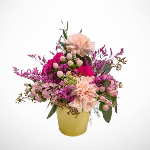 Bright Sunshine Bouquet - Bright Sunshine Bouquet  Brighten someone's day with our delightful Bright Sunshine Bouquet! Featuring a vibrant mix of soft blush carnations, bright hot pink gerbera daisies, and other soft pink flowers, this cheerful arrangement is presented in a bright yellow pail, adding a splash of sunshine to any space. Whether you’re sending birthday wishes or get-well sentiments, this bouquet is the perfect choice for spreading joy and positivity.  Designed to fit perfectly on a desk or bedside table, the Bright Sunshine Bouquet brings warmth and charm to any room. Its compact size and vibrant colors make it a lovely addition to any home or office setting.  At Specialty Floral Design, we pride ourselves on providing fresh, beautifully crafted arrangements. We offer same-day flower delivery in Olympia, WA, Tumwater, WA, Lacey, WA, and surrounding areas, including Yelm, Shelton, and Centralia, WA. Whether you need a thoughtful gift or a pick-me-up for yourself, trust your local Olympia florist for exceptional flower delivery service.  Order the Bright Sunshine Bouquet today and let us deliver a burst of happiness right to your door!
