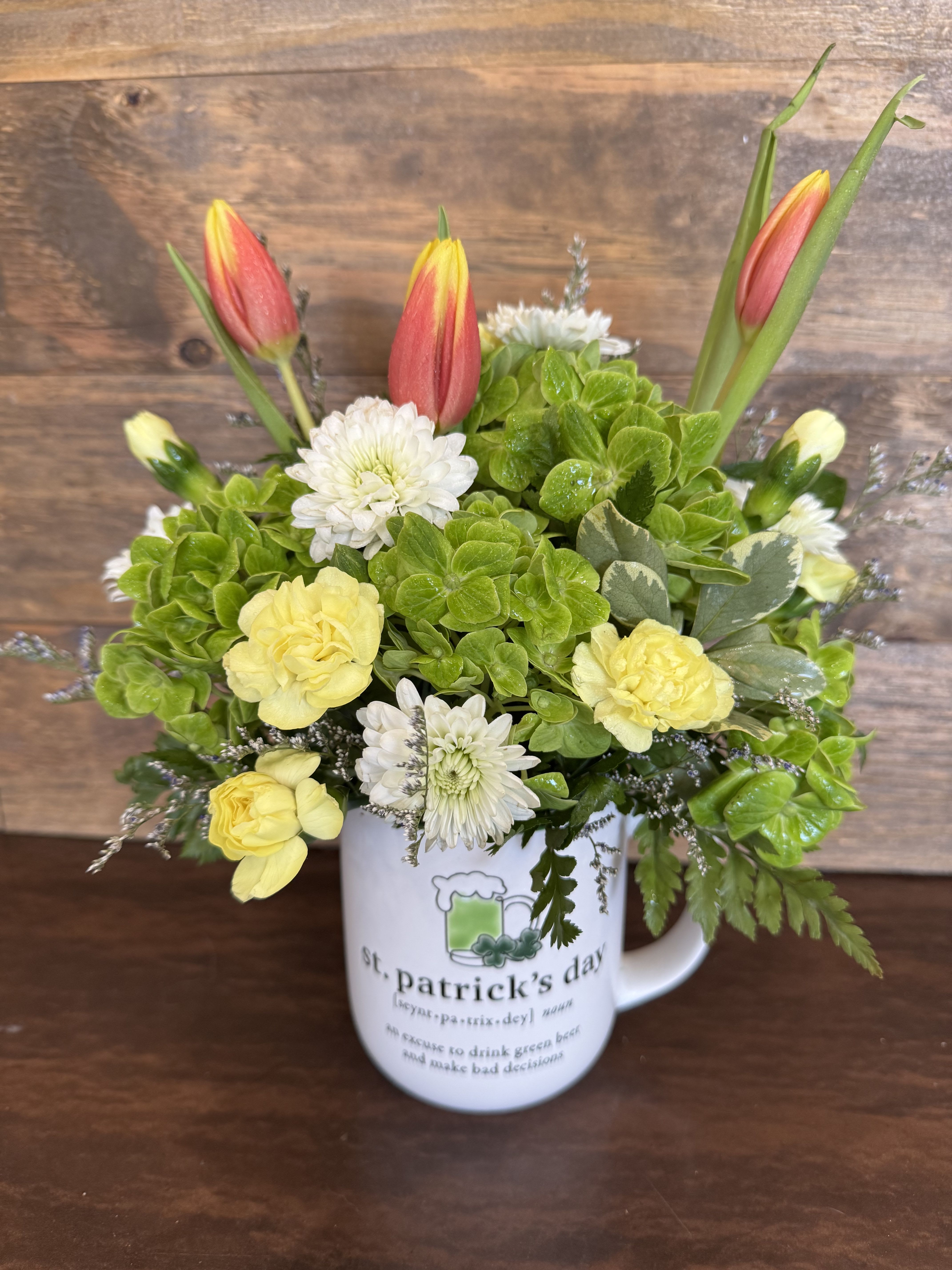 Mug Full of Luck  - A fun St Patrick’s Dat mug will definitely make that special person smile. Filled with hydrangea, tulips, button mums and mini carnations.