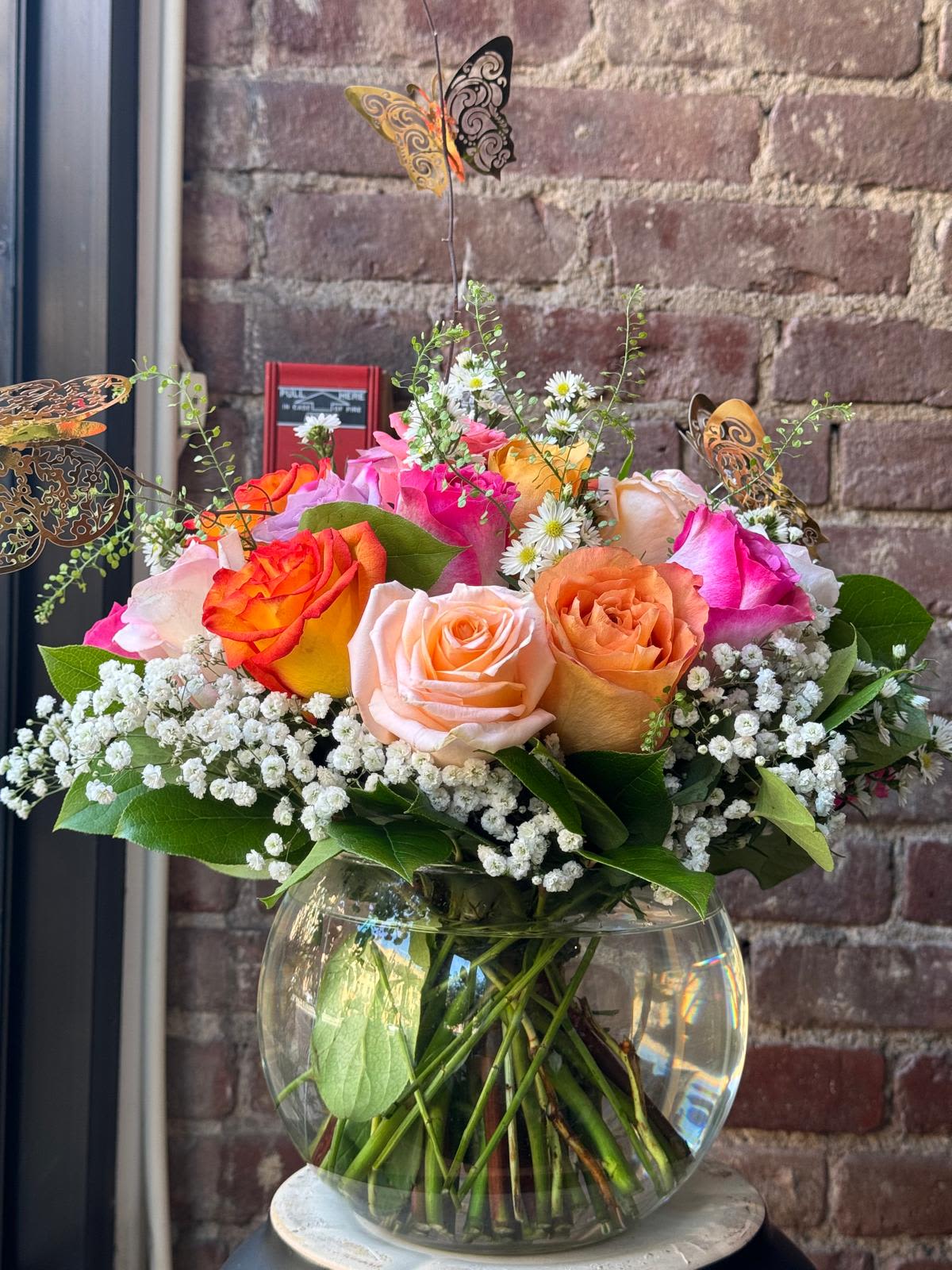 Daybreak  - A lovely bowl of colorful roses brightens and lifts any room (and relationship!) A great gift for sending on Valentine's Day to your significant other, your friend, or even your mom!  Approximate Dimensions: 11''D x 11''H