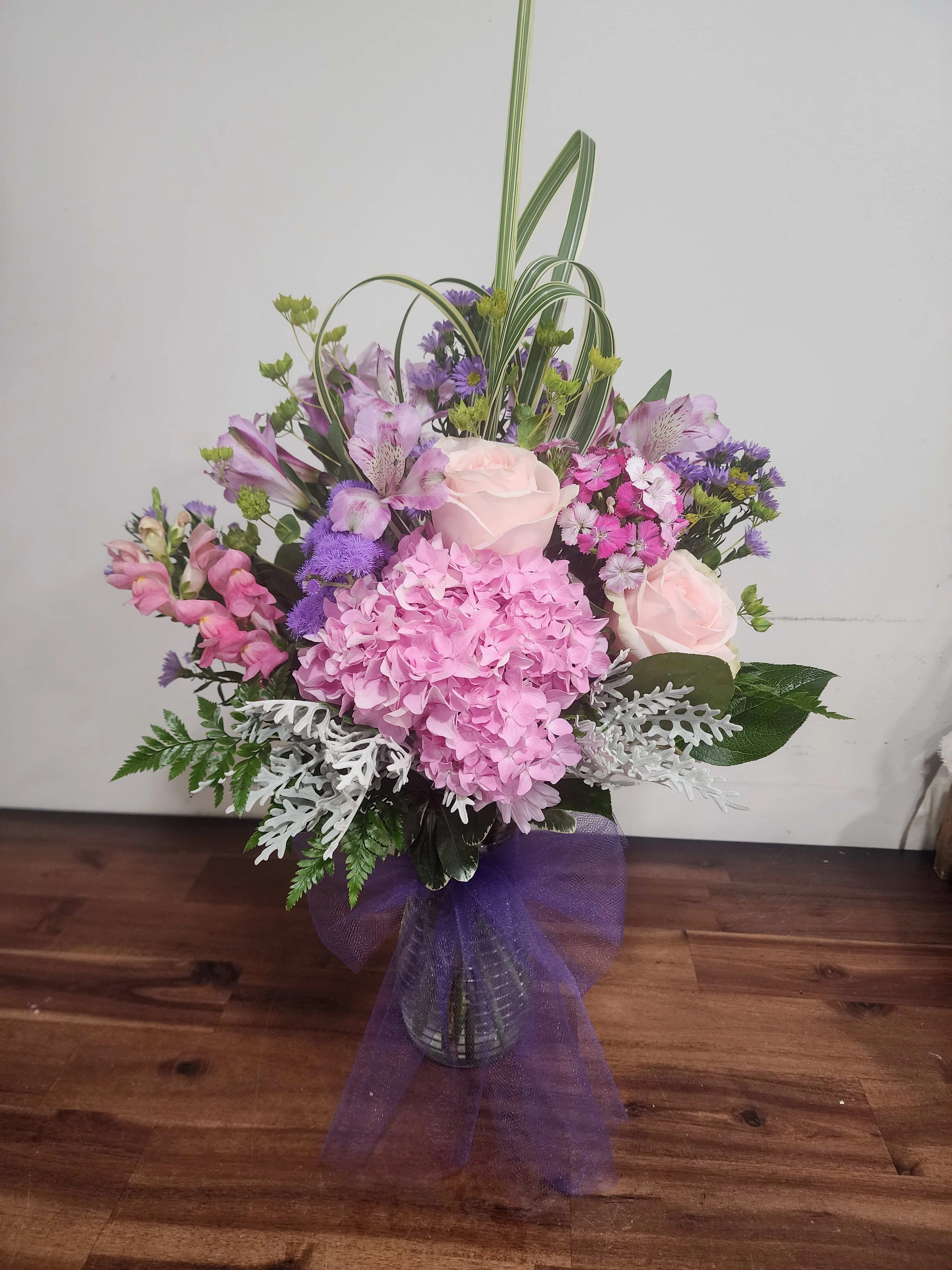 Cotton Candy by MG Florist  - Designed in a vase with hydrangea, alstroemeria, roses and other accent flowers.  Color shades and flowers may vary.