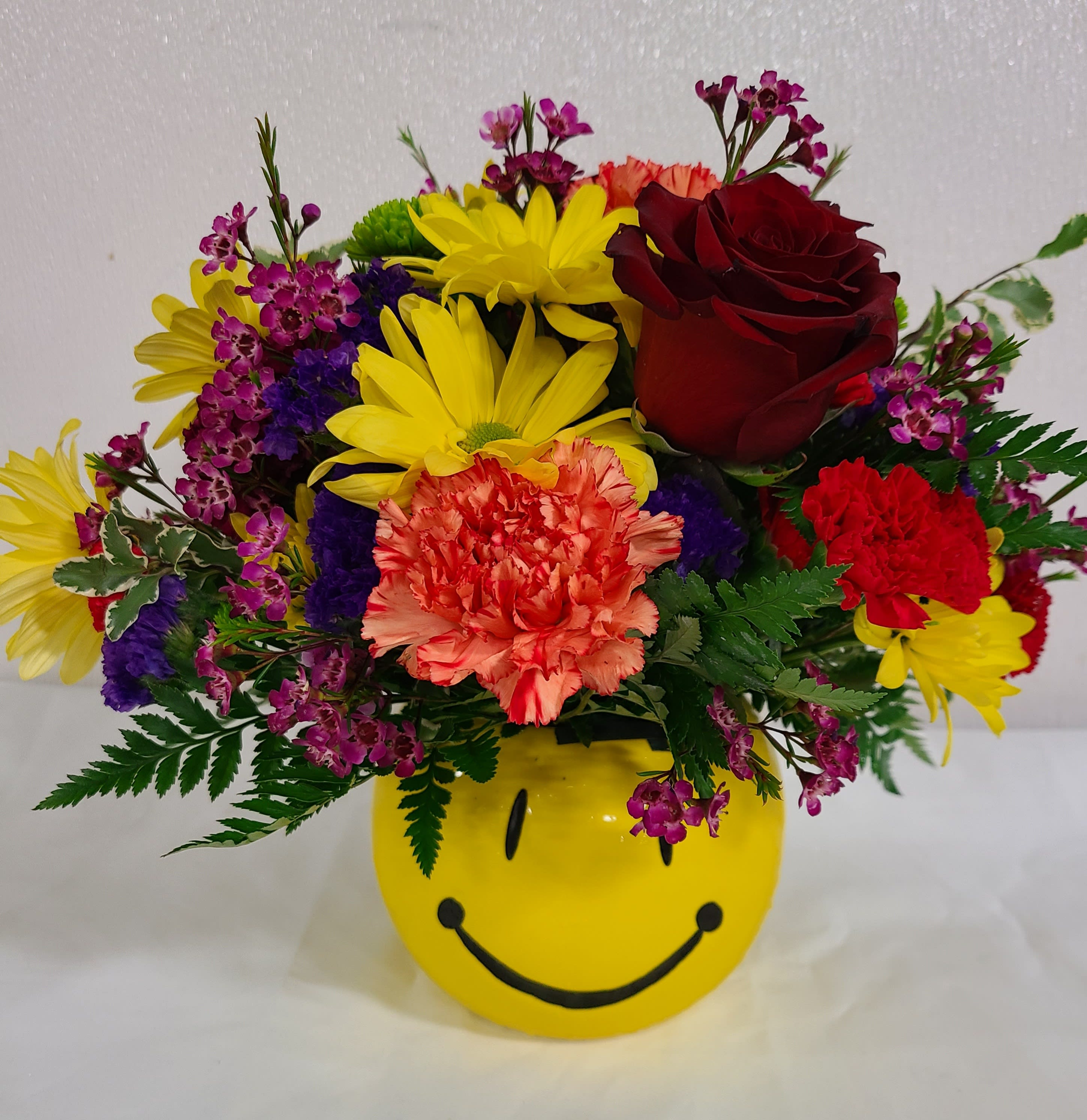 It's a happy face day - Yellow happy face bowl with mixed colorful flowers