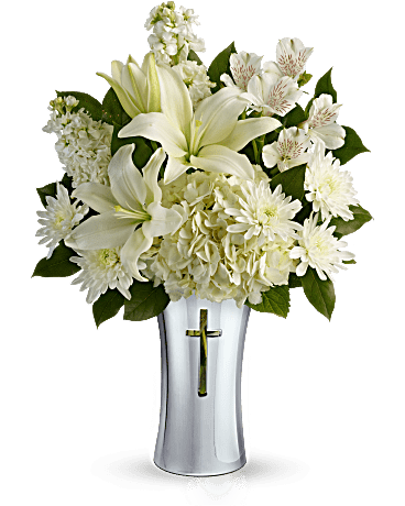 Shining Spirit Bouquet T277-1A - A shining tribute to a life well lived, this pure white bouquet of hydrangea and lilies is arranged in a beautiful ceramic vase with gleaming metallized finish and reverent cross cut-out. It's a lovely gift of remembrance for the home or service. White hydrangea, white asiatic lilies, white alstroemeria, white stock, and white cushion spray chrysanthemums. Delivered in Teleflora's Shining Cross vase. One-Sided Similar arrangement. 