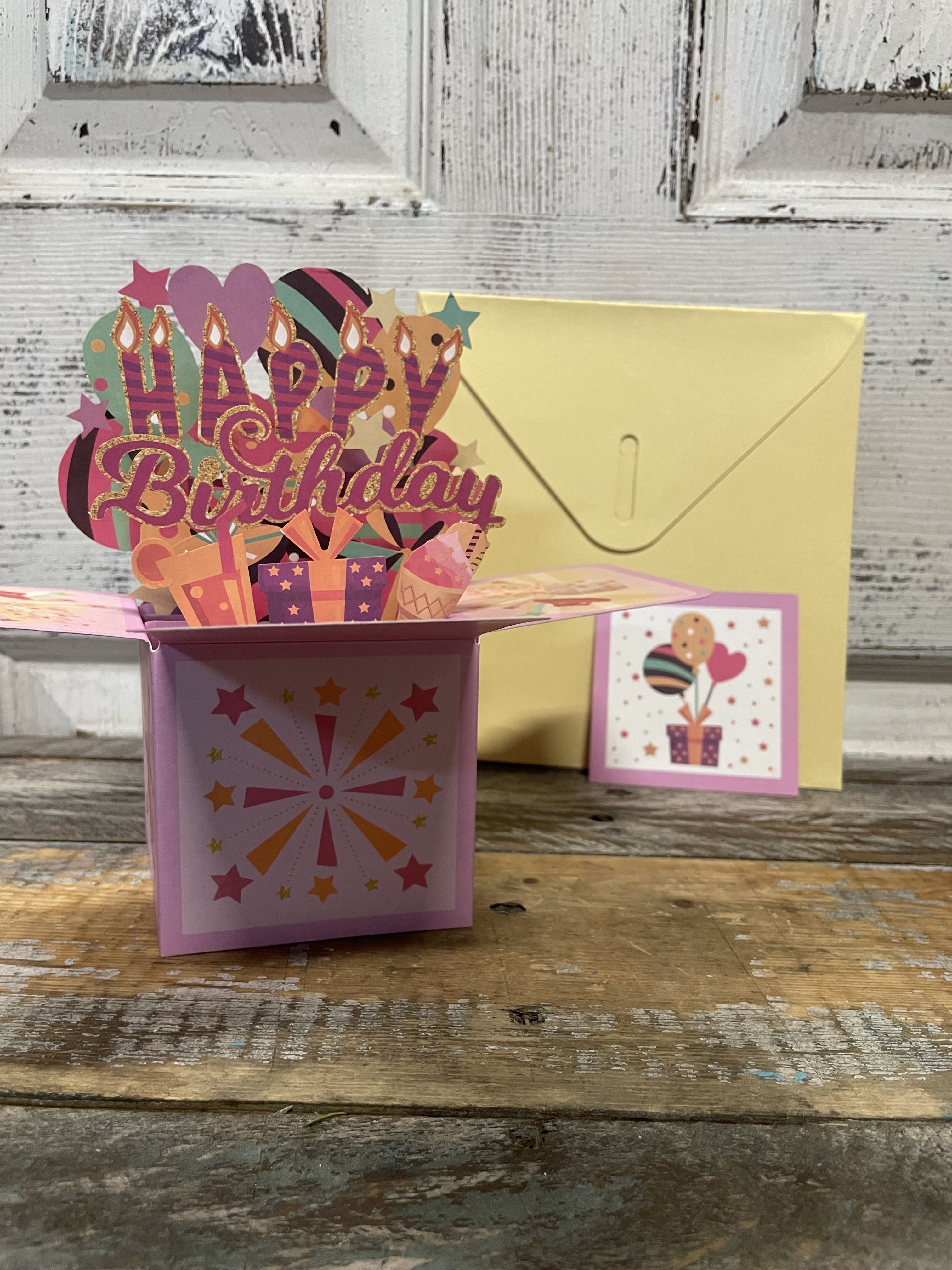Pop-Up Birthday Card Pop-Up Birthday Card - Don't forget the Birthday card with your beautiful floral arrangement!! A unique touch to celebrate a special day. Note: your message will be written on a smaller card that comes with this pop-up