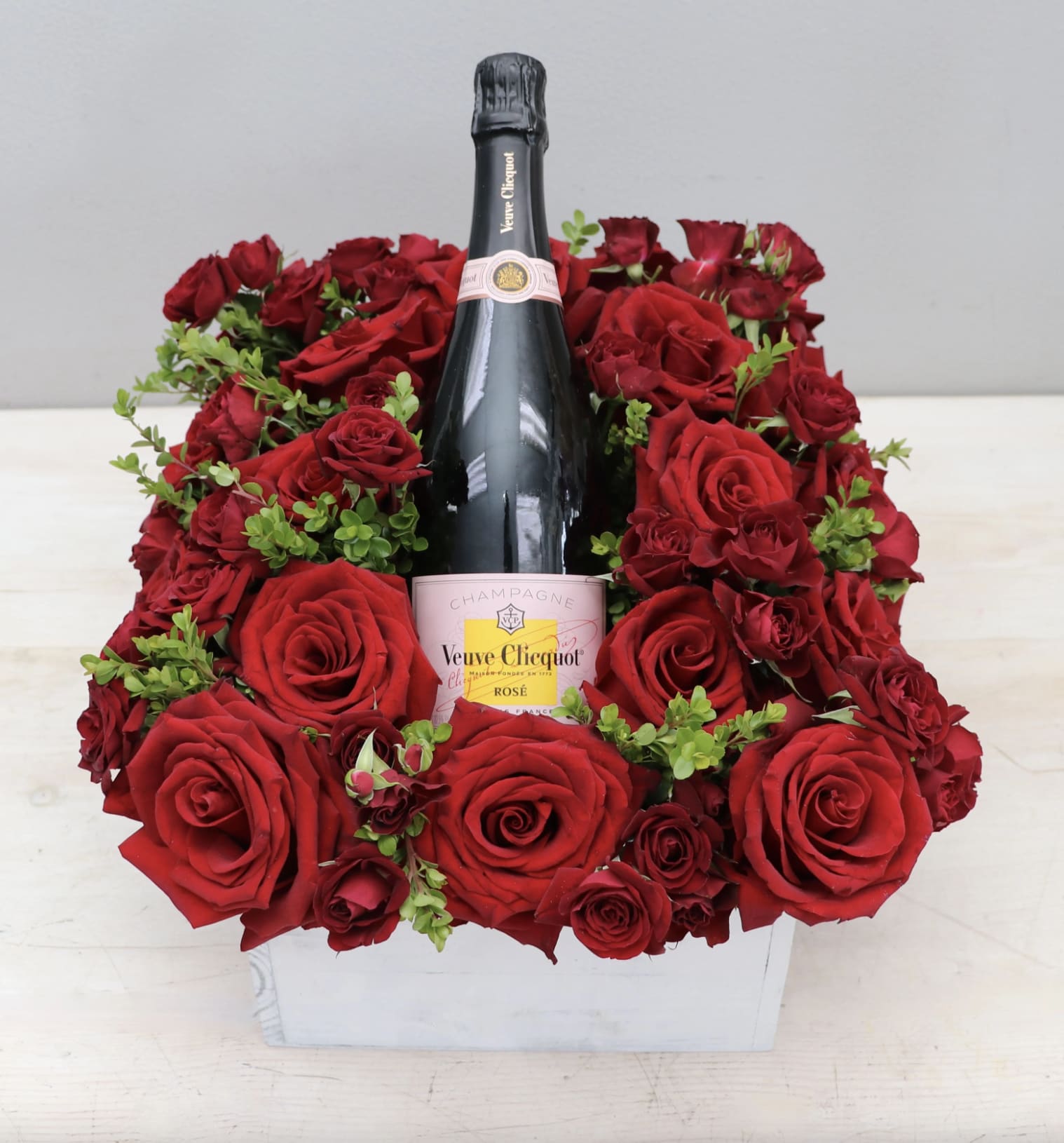 Romantic Red Rose Gift - LA - Feature your favorite bottle of bubbly surrounded lush red roses. Perfect for a romantic celebration!  Please call or text about bottle selection