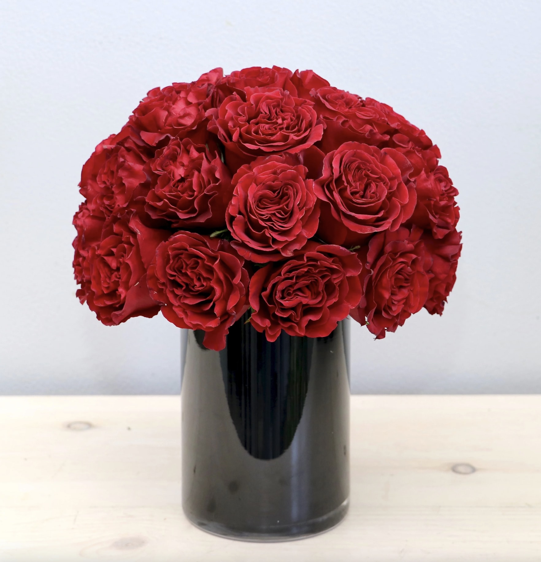 Rose Love - LA - Red garden roses are the highlight of this arrangement, making it the perfect gift for your loved one. It stands approximately 15&quot; tall in the standard size.