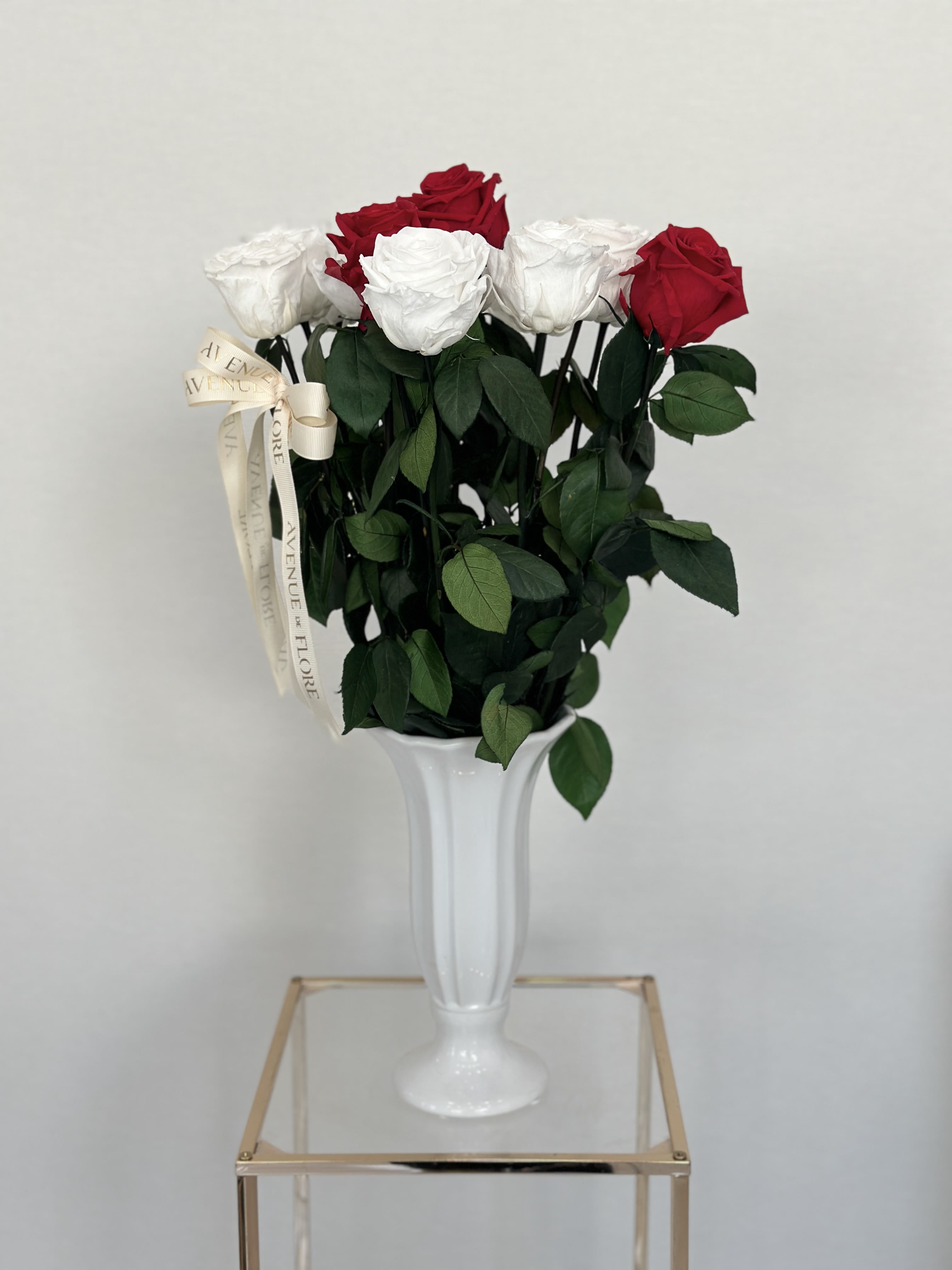 Forever Chic - Red and White Long Stem Preserved Roses - Elevate your home decor with this chic vase, beautifully adorned with luxurious red and white eternal roses that last for 1-3 years. The elegant vase adds a touch of sophistication to any space, making it a perfect centerpiece for a living room, bedroom, or office.  PRESERVED ROSES.