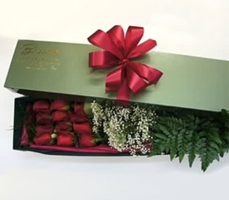 Especially For You Box of Roses Especially For You Box of Roses - Imagine the smile when this box is delivered. A dozen gorgeous, lush roses carefully chosen to delight. The roses are wrapped in baby's breath, tree fern, leather leaf and presented in a box tied with a red bow. Roses are available in red, pink, yellow, lavender, white or mixed. As Shown : BF-vdbr