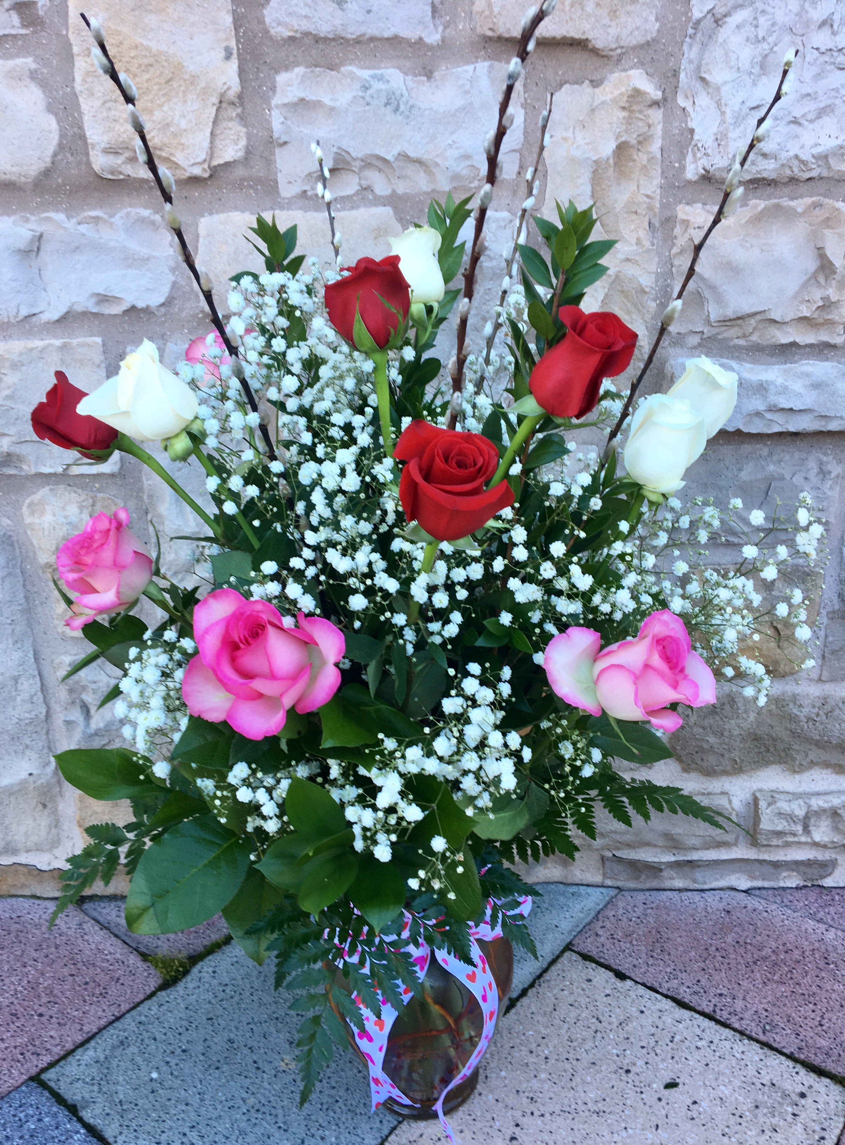 Pretty Woman - A beautiful dozen rose collection of Valentines Day colors    Red, White and Pink Roses to Celebrate your Affection
