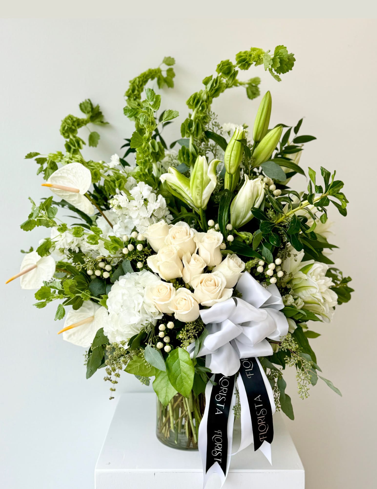 LARGE FUNERAL PIECE  - A beautiful arrangement, crafted to honor and remember a loved one with grace and sympathy.
