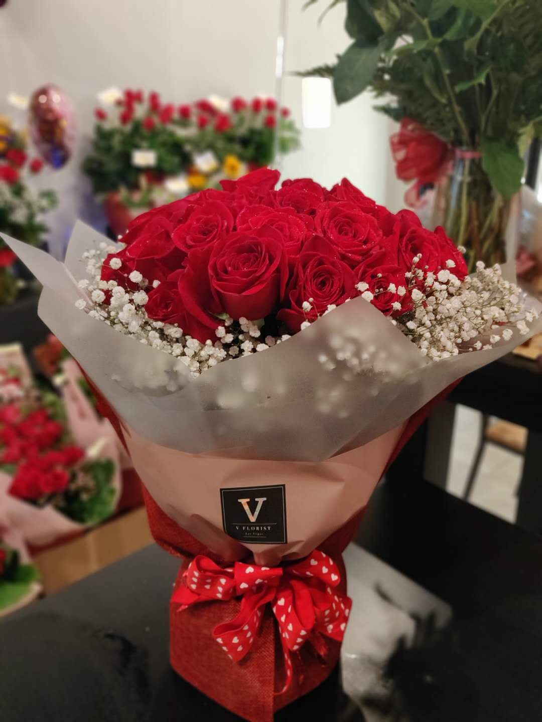 Breathtaking Beauty Bouquet - Our florist choice of 36 fresh red roses to create an Asian deluxe Wrapped bouquet.  Perfect for special occasion such as proposal, anniversary, Valentines Day, etc