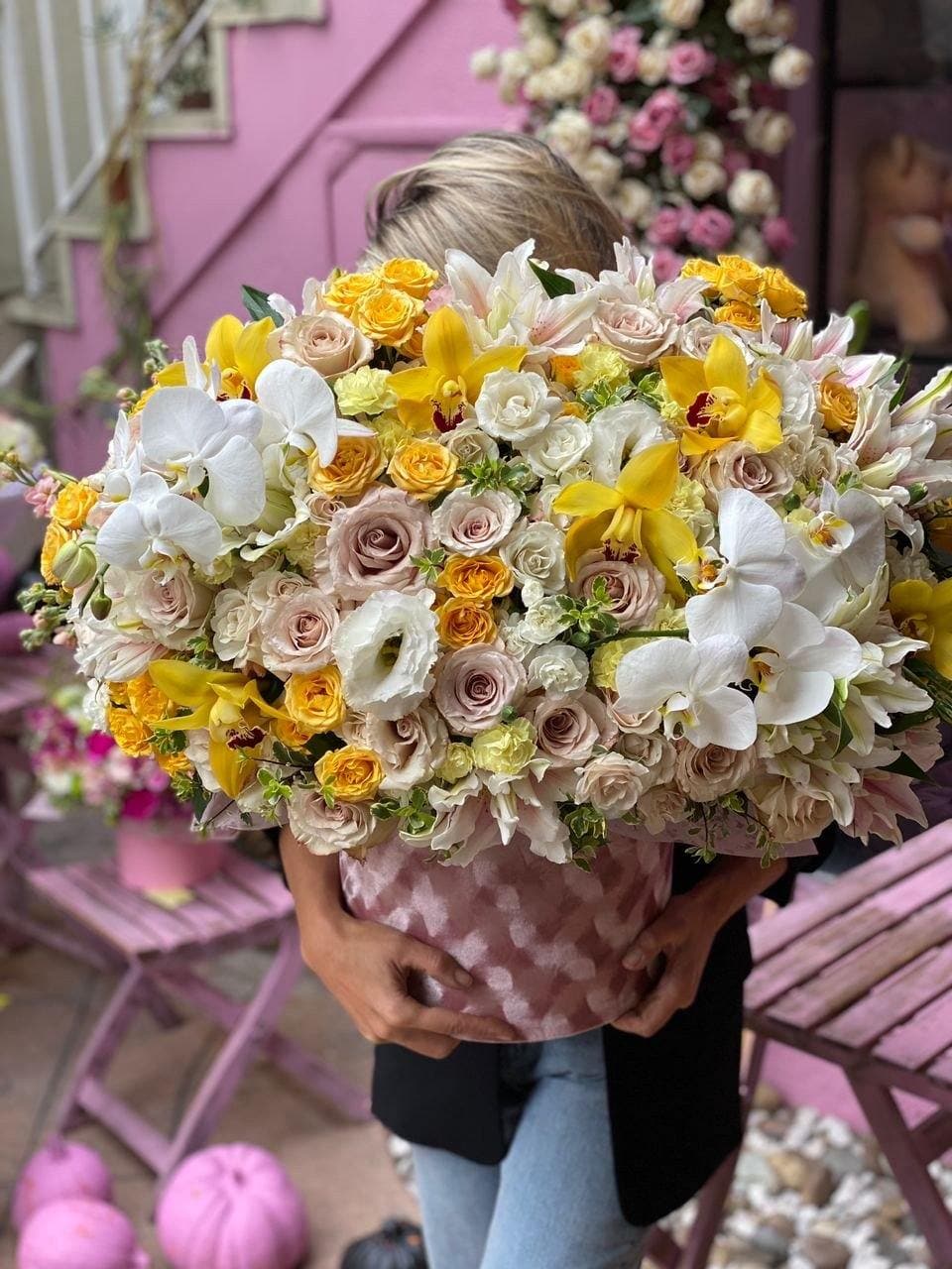 Arleta - Arleta is a beautiful floral arrangement with white orchids, lilies, nude roses, yellow spray roses. Perfect for birthdays, anniversaries, or sending flowers to brighten someone’s day.