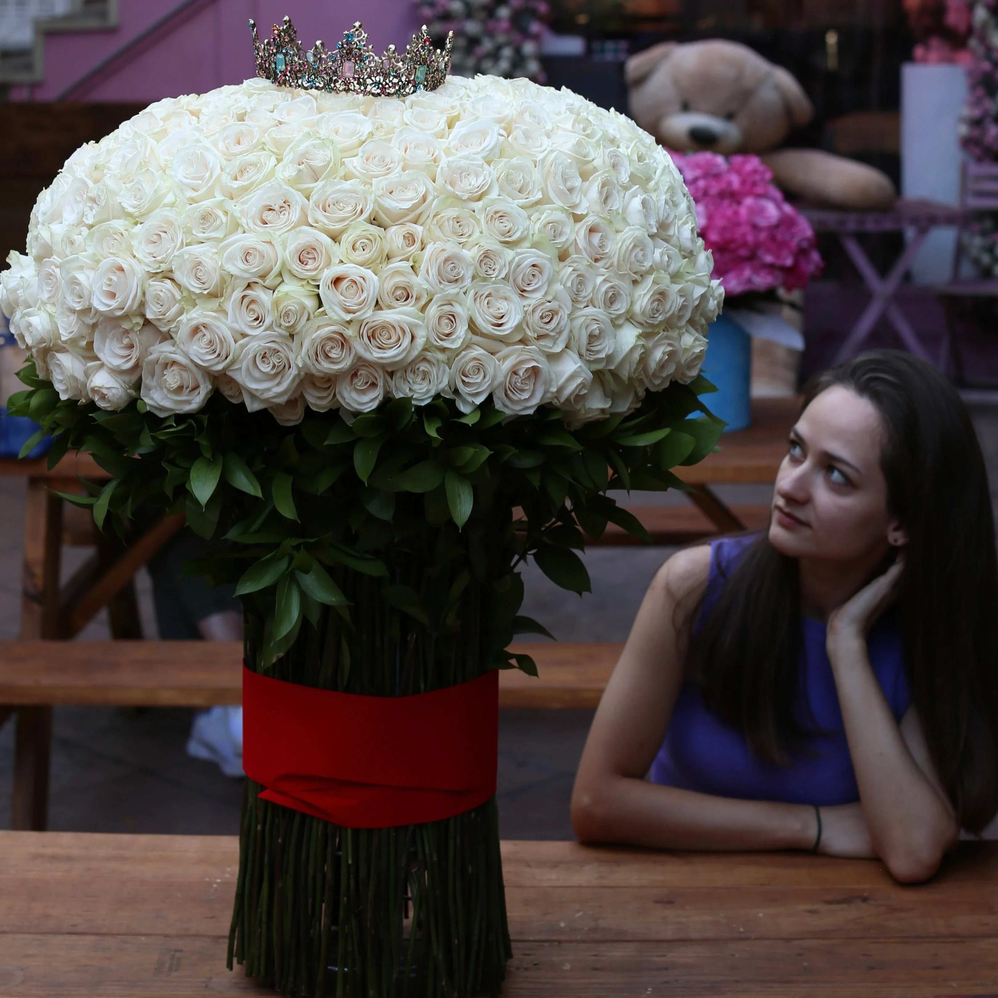 250 roses - A breathtaking bouquet of 250 fresh roses, arranged in a perfect round shape and tied with a luxurious red ribbon to stand out among other bouquets. This special arrangement can express your emotions without words, making it perfect for special occasions, anniversaries, proposals, or simply showing your deepest feelings.