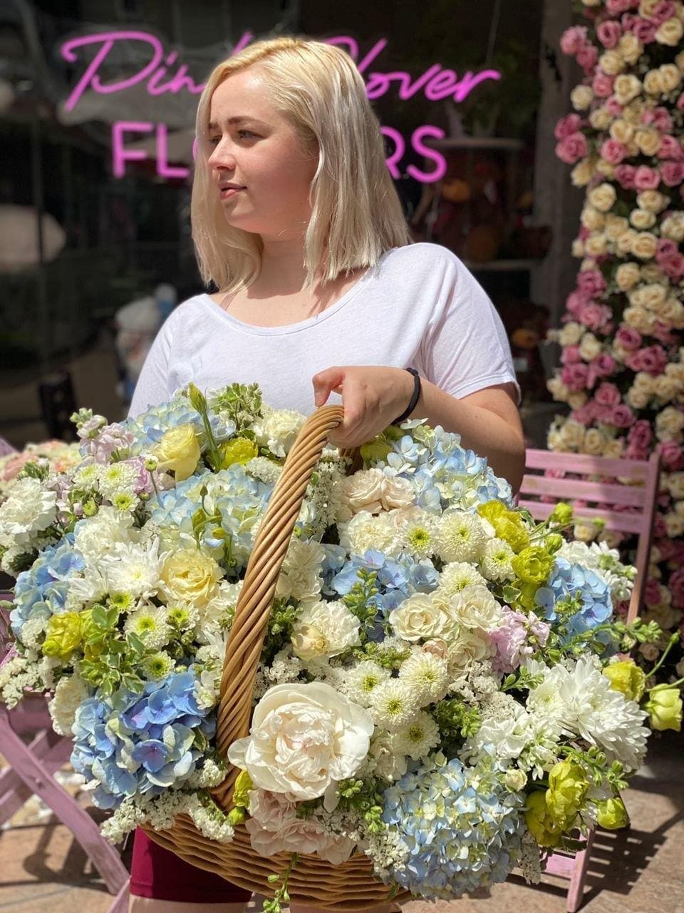 Diana - Diana is a beautiful floral arrangement with hydrangeas, lisianthus, blooms, greenery, roses, and other flowers. 