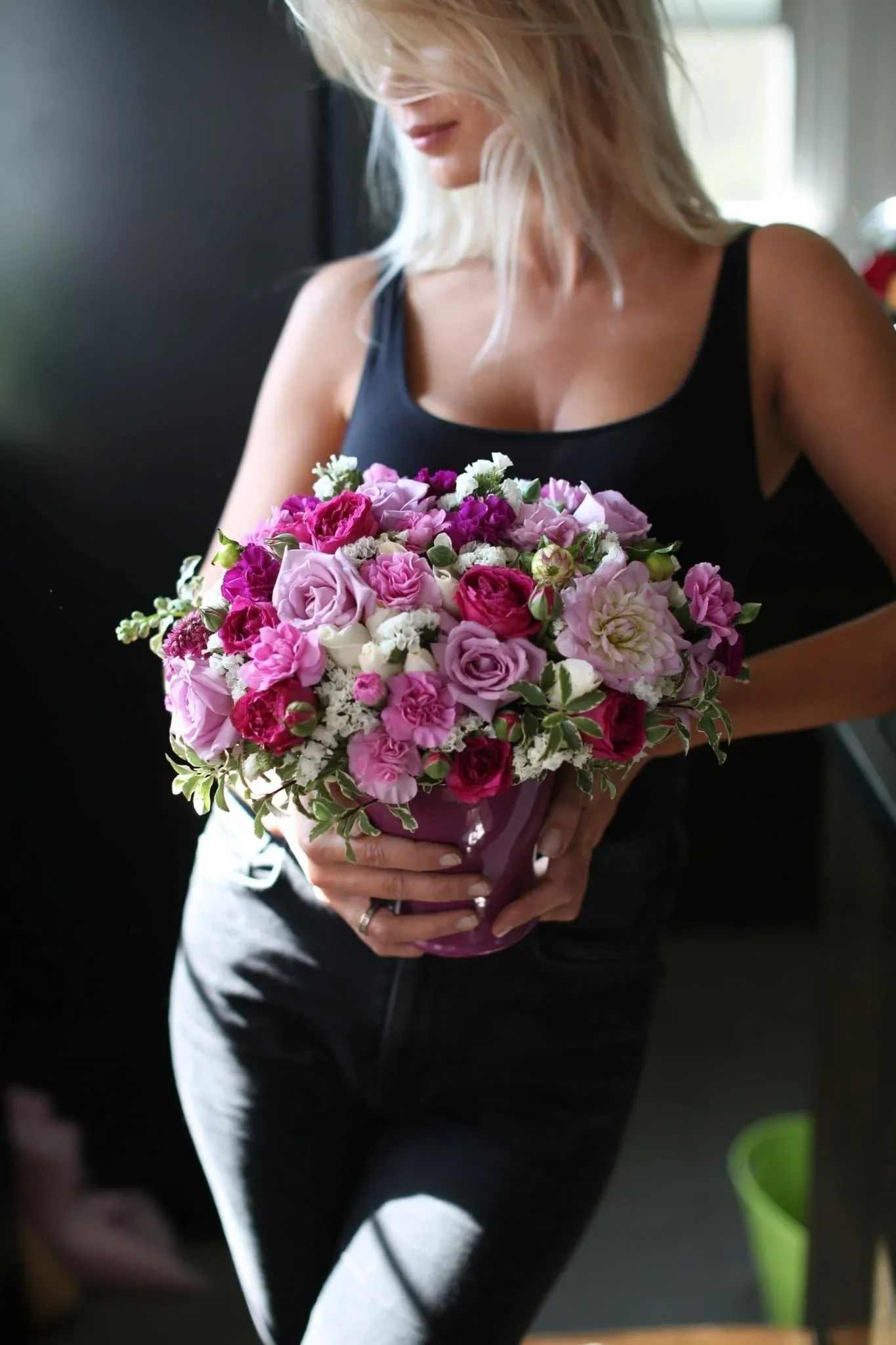 Anastasia - Anastasia is a pink flower arrangement with pink and white roses, purple carnations and lisianthus. This flower arrangement is a perfect flower gift for birthday, anniversary, or just because.