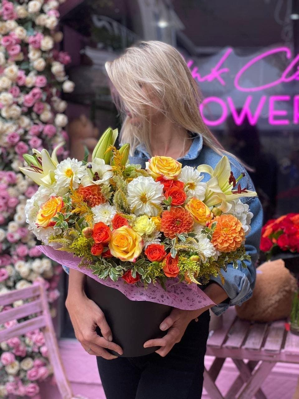 Amelita - Amelita is a cute and colorful flower box with bright dahlias, orange garden roses, yellow roses, mums, carnations and greenery. This flower arrangement adds a fresh and cheerful touch to any space, making it a perfect choice to gift for a birthday or wish to get well soon. 