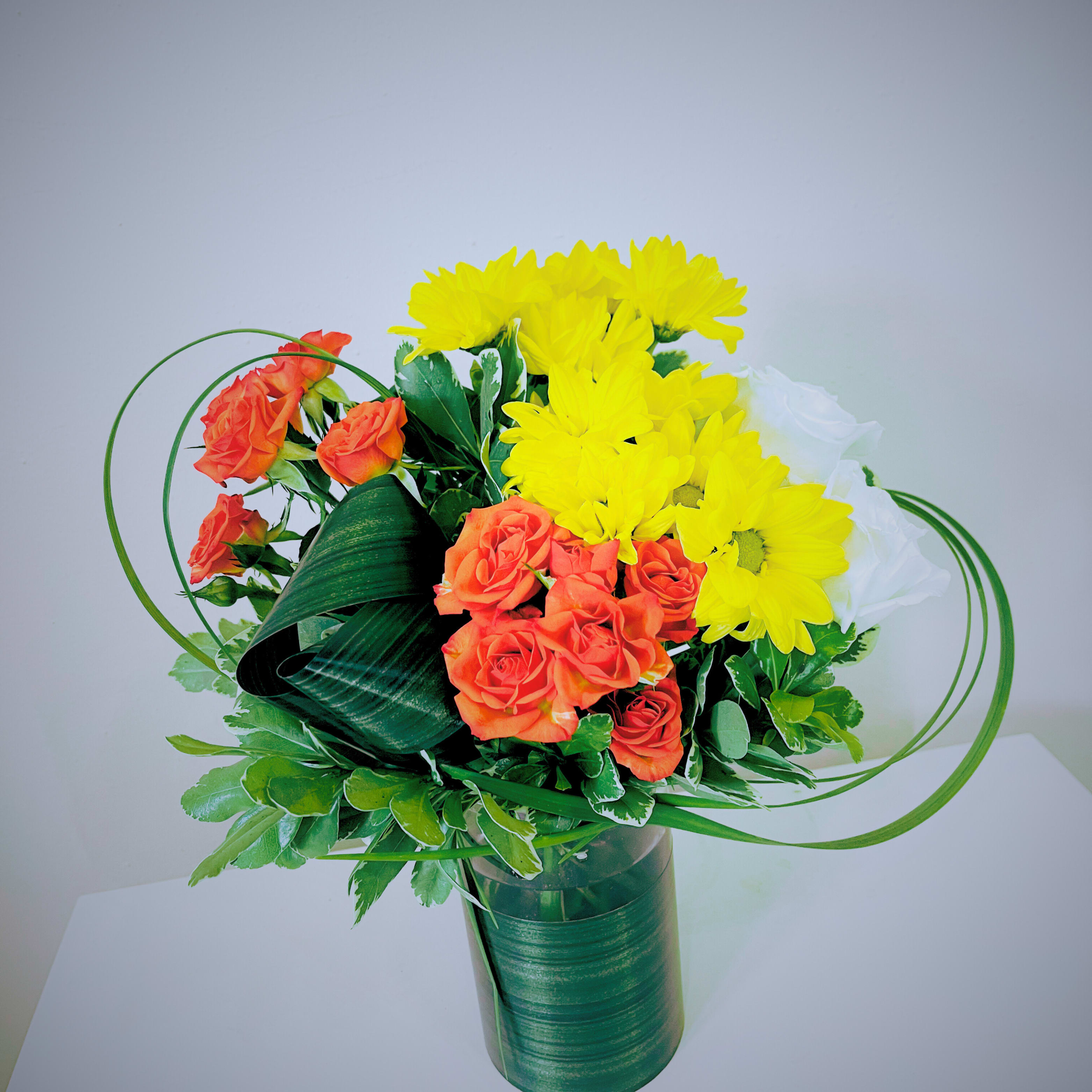 Zen Blossom - A serene arrangement of soft blooms in calming whites, greens, and pastels, designed to bring peace and balance to any space. Perfect for creating a tranquil ambiance or as a thoughtful gift. Available for pickup or delivery in the Seattle area.