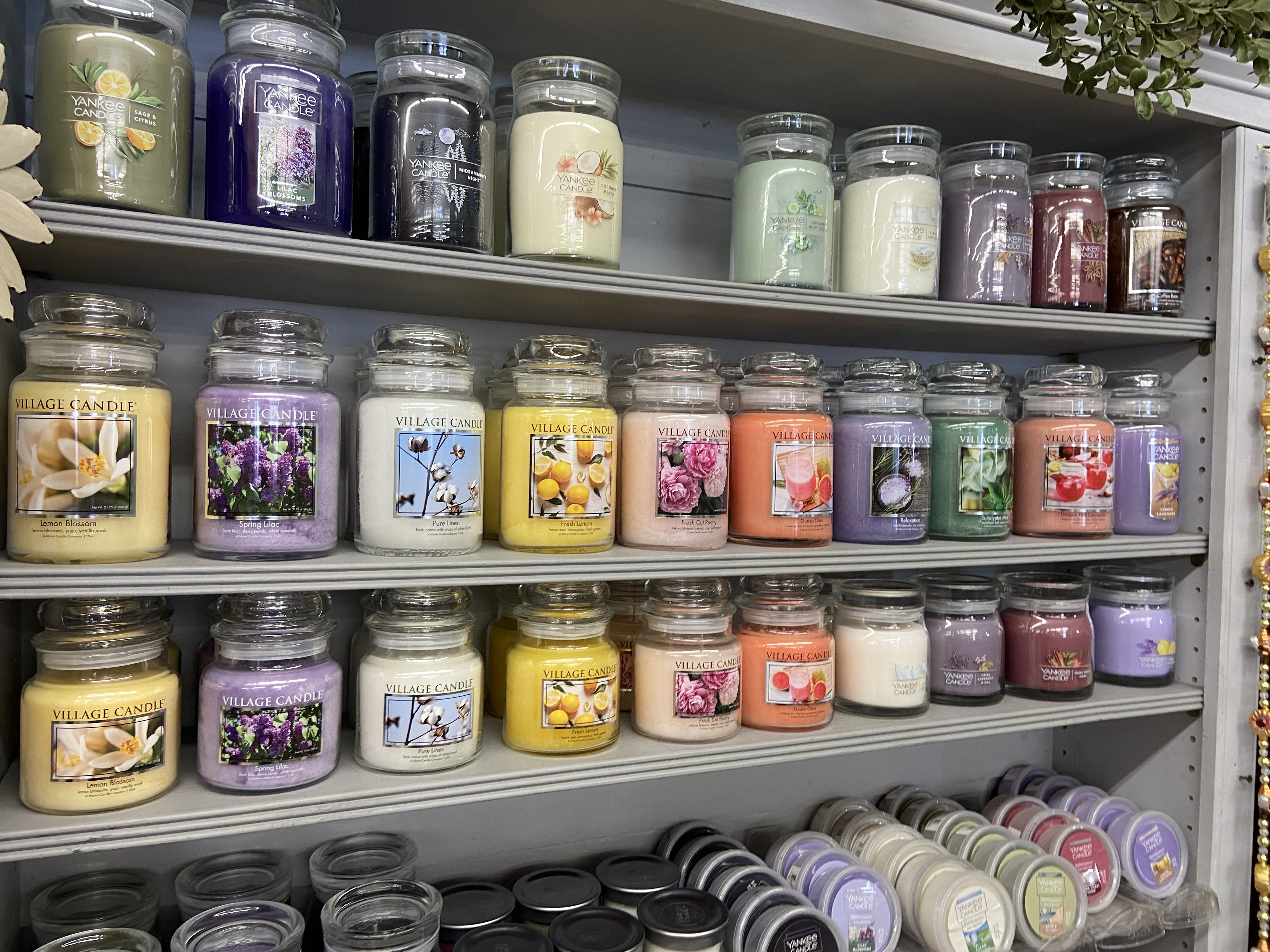 Village Candle Village Candle - Delight the senses with a candle from Village Candle. Standard size: 14 oz: $17.88 Deluxe: 21.25 oz: $22.99. Please leave your requested scent in the description: Lemon Blossom, Spring Lilac, Pure Linen, Fresh Lemon, Fresh Cut Peony, Guava Citrus, Relaxation.