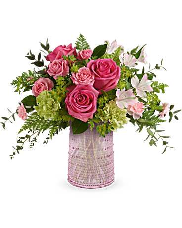 Sparkling joy - Delight Mom with Teleflora's Sparkling Joy Bouquet, delivered in a pink glass carafe with elegant beaded details. Paired with hot pink roses, pink spray roses, light pink alstroemeria, and other pretty blooms, this keepsake meets FDA tableware standards to safely serve and store drinks, adding beauty to any table year-round. 