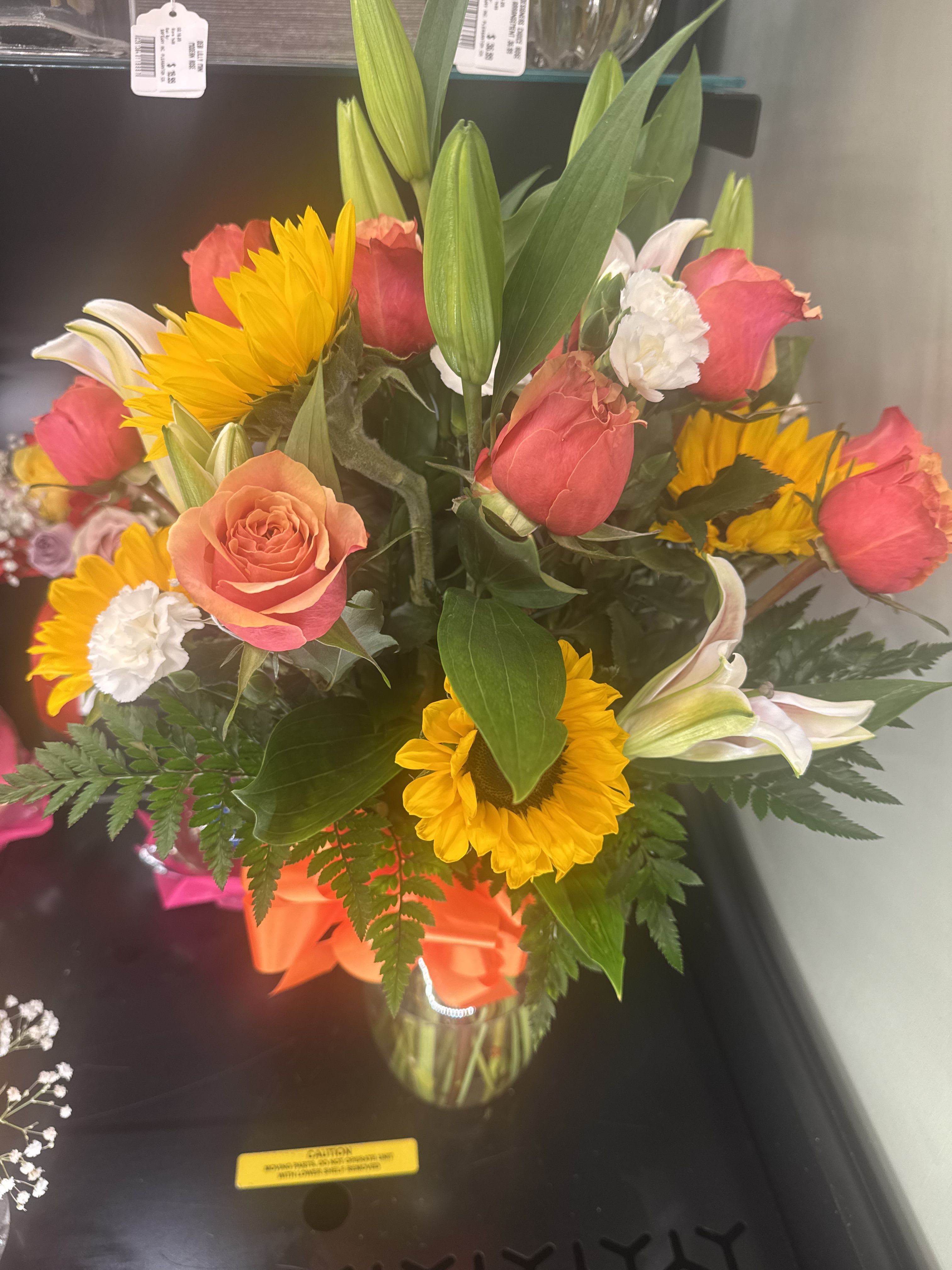 Boho Breeze by BloomNation™ - A boho arrangement featuring an eclectic mix of flowers and textures, this arrangement is a   very trendy gift good for a lot of different occasions.  Approximate Dimensions: 9&quot;D x 13&quot;H
