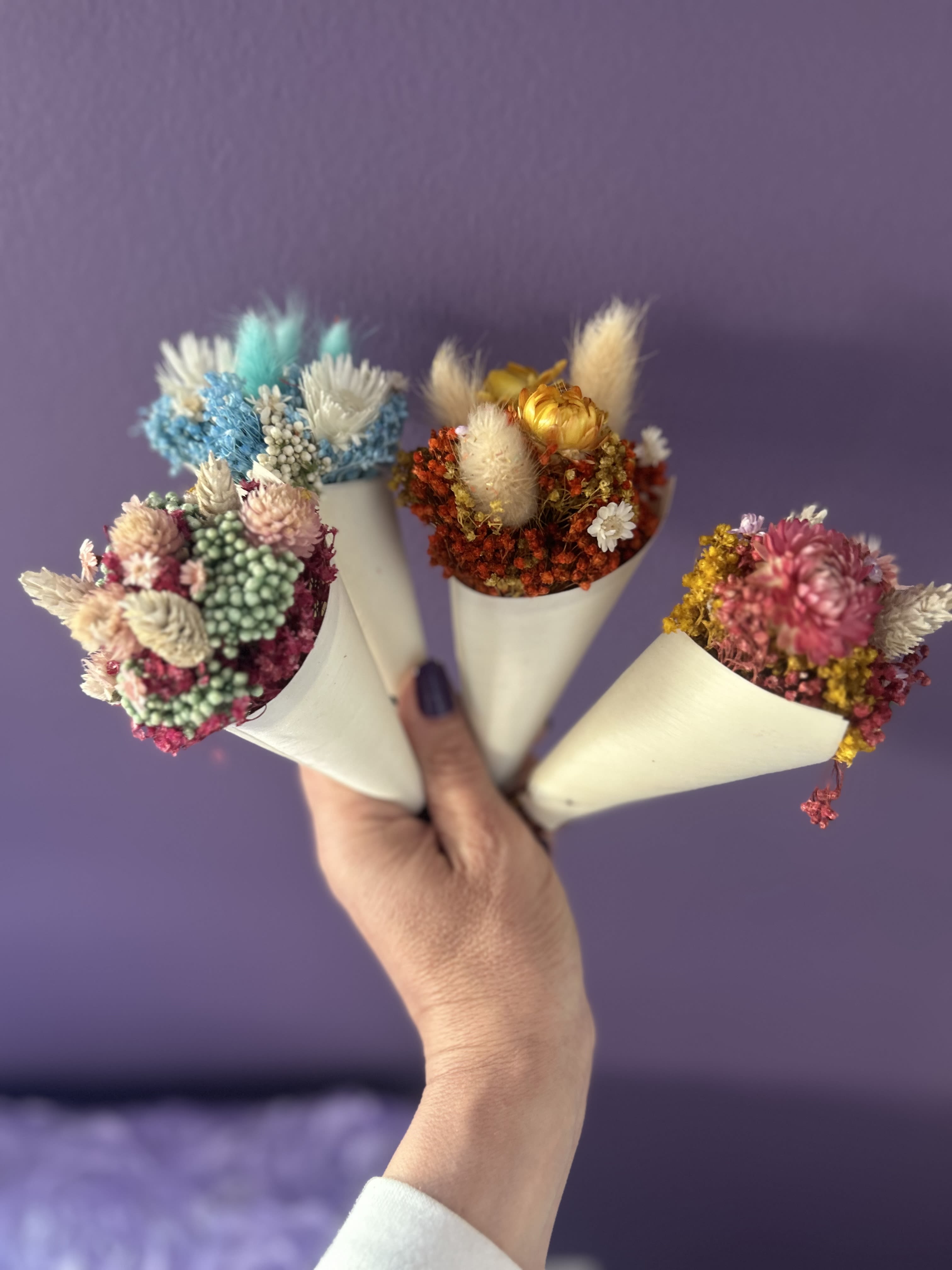 Everlasting Pixie Mini Bouquets  - Searching for a little pick me up?  Look no further than our Everlasting Pixie Bouquet. Measuring about 6” from the top to bottom, Pixies are perfect little presents!  Crafted from 100% real flowers and expertly preserved.  All created by hand in the good ole USA! Weight 1.23oz  Want in bulk in spring colors- message us and we will take a custom order. 