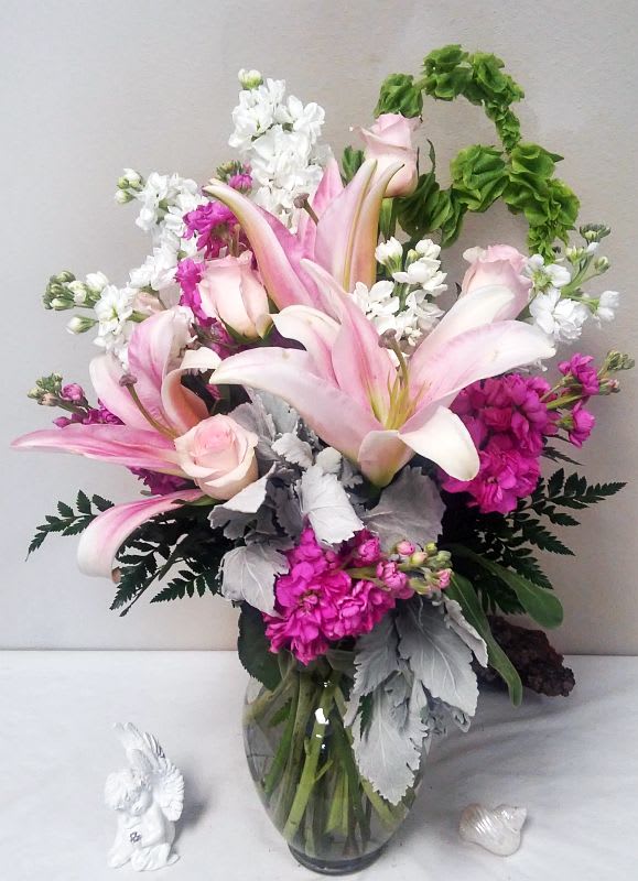 Shades of Pink Shades of Pink - A fun, festive mix of pretty pink blossoms – including fancy fresh flowers such as roses, lilies and stock, in complementary blushing tones – creates a magnificent display that’s a lovely gesture for a birthday, anniversary or other special day.