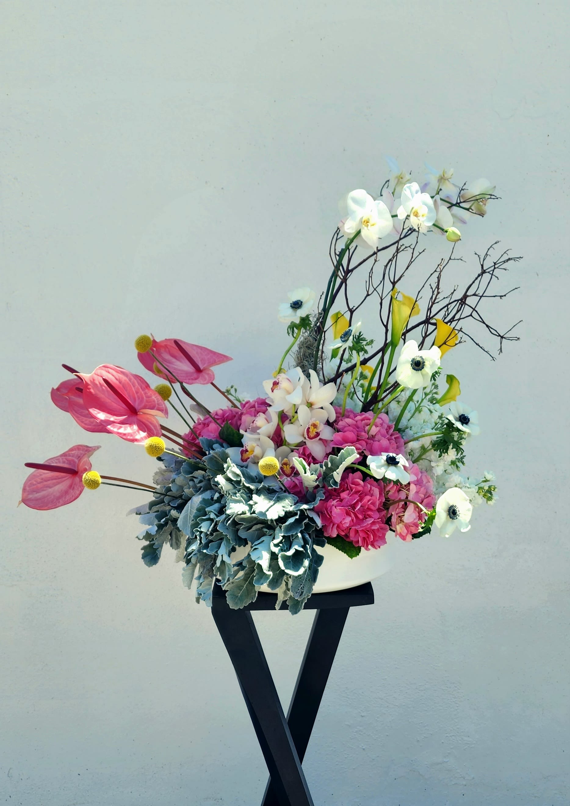 Like a Fairytale - Soft delicate flowers in a beautiful array of colors, with accent pieces...  just is like a match made in a fairytale. Whether you want to show someone your love and appreciation, or create a showstopper inside of your own home, let our team know if you would like for them to create a one of a kind piece inspired by this one.