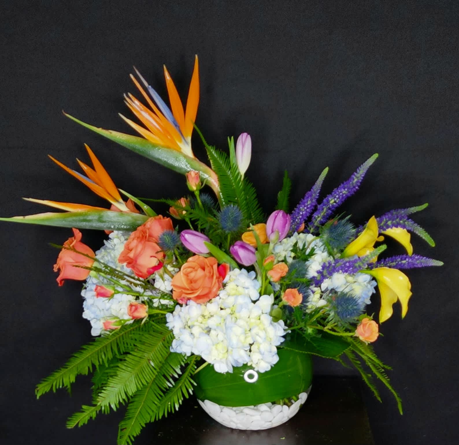 Birds of Paradise - Allow this tropical arrangement to inspire a desire for color in any home, office, or space. 