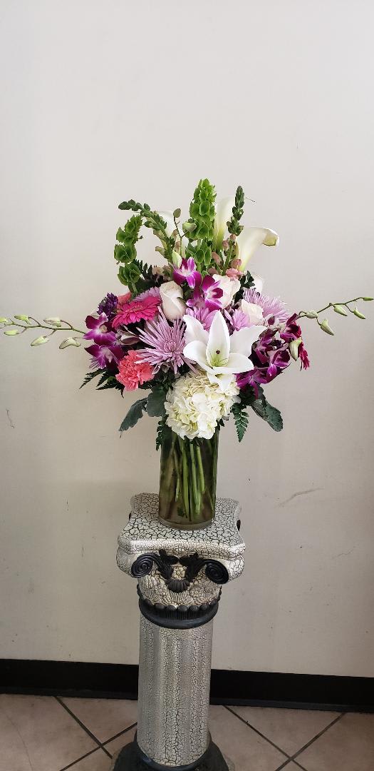 Mixed Vase Arrangement Mixed Vase Arrangement - Cylinder Vase with lily, gerbera, orchid, bell, cala lily, hydrangea