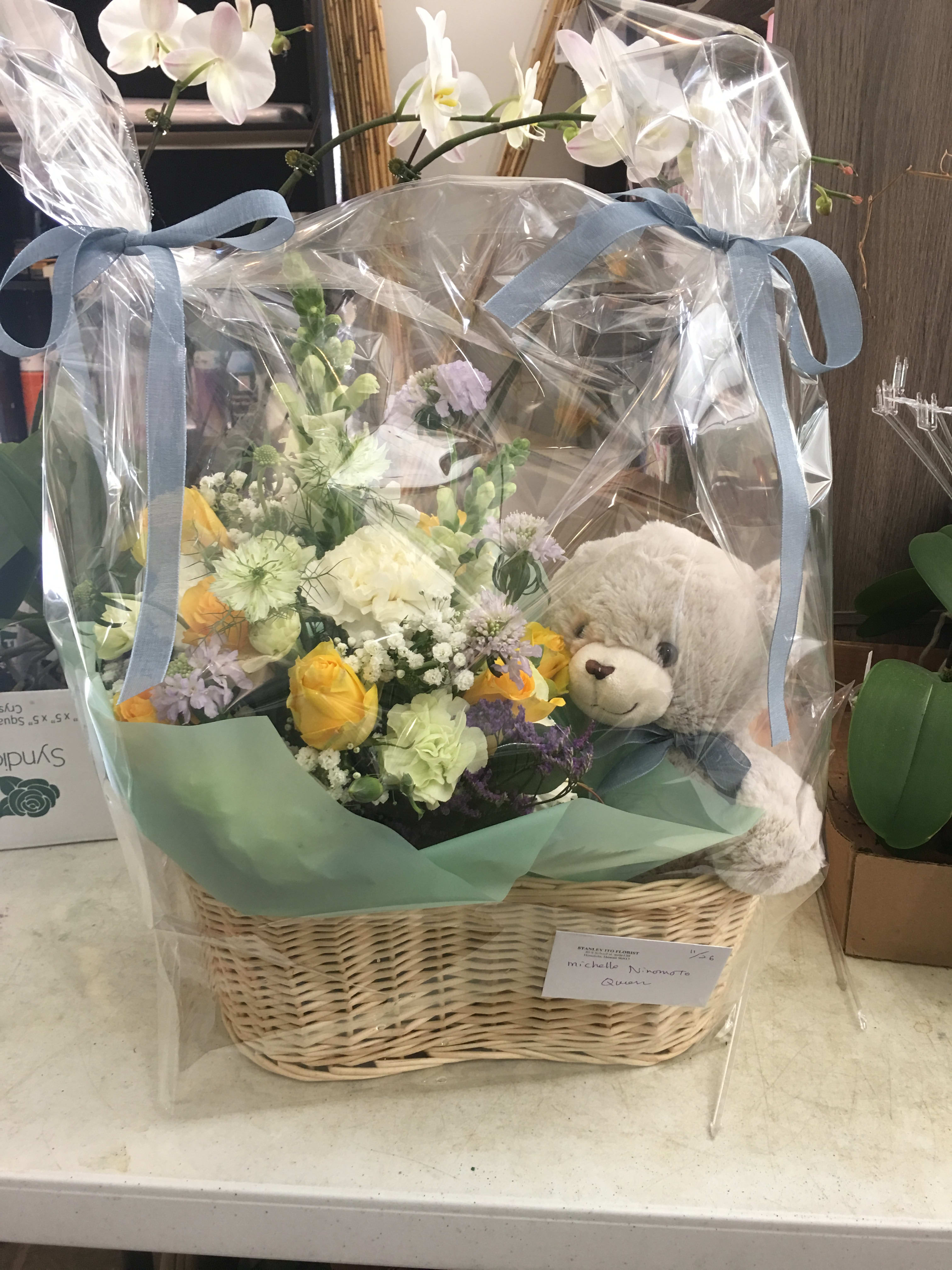 #157 designer choice new born baby arrangement with teddy bear & mini balloon #157 designer choice new born baby arrangement with teddy bear & mini balloon - baby boy or baby girl arrangement with teddy bear and mini mylar balloon we packaged all together in the basket.