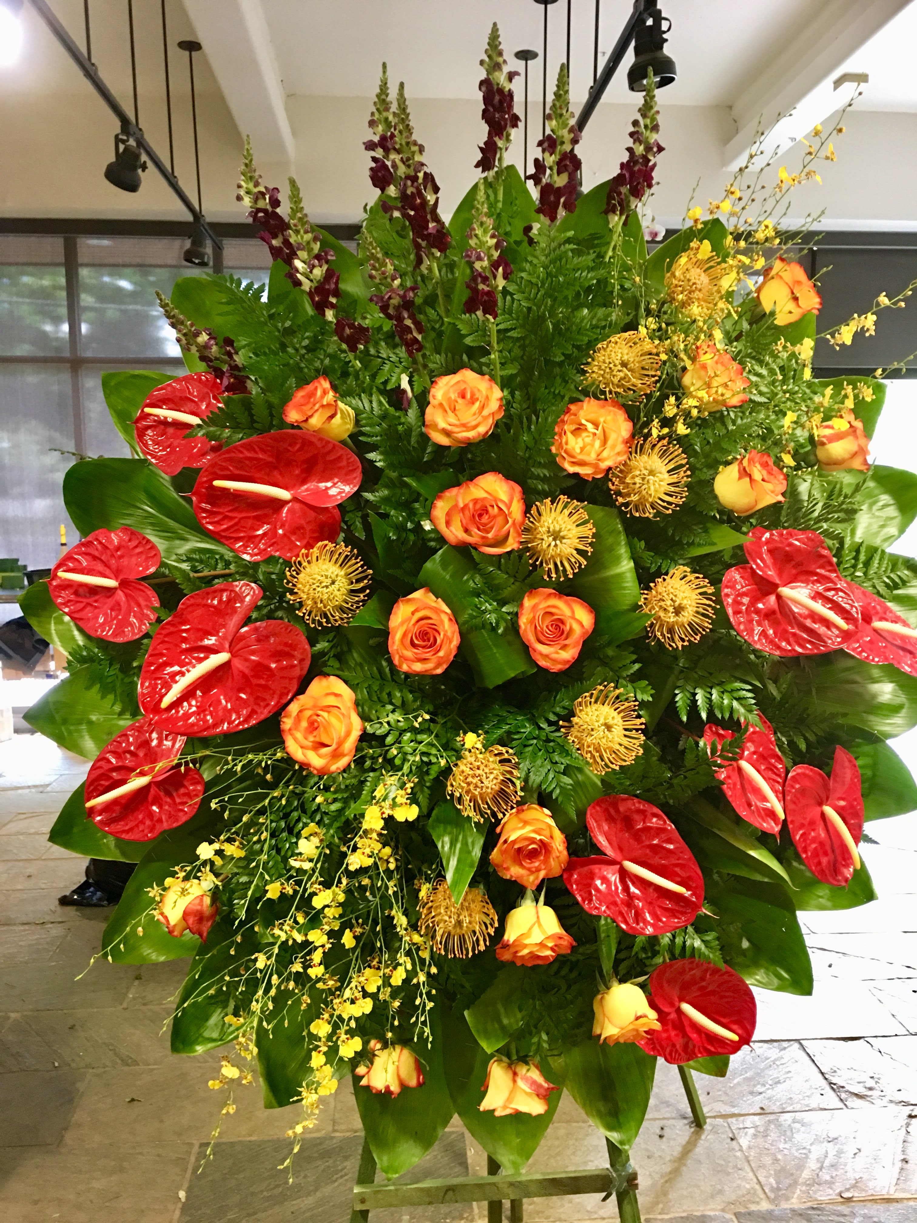 #97 Elegant Sunset Spray #97 Elegant Sunset Spray - Red Anthurium, Orange Roses - 6' Stand