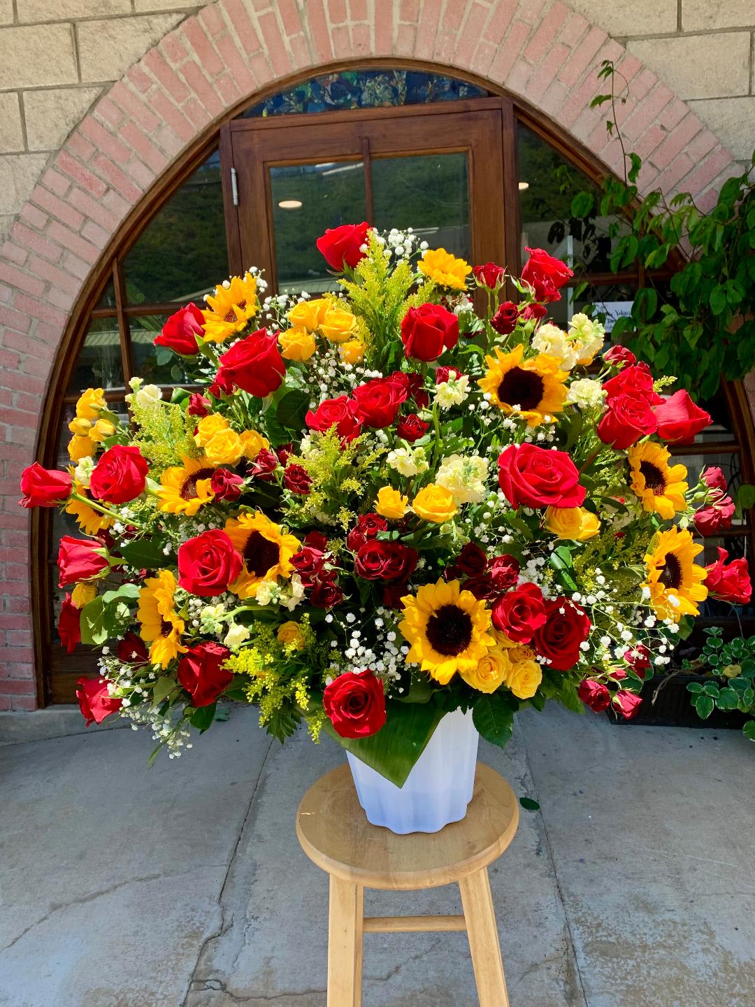 sunflower and red  rose mix alter - standard as shown deluxe will be more fuller with sunflowers and red roses 
