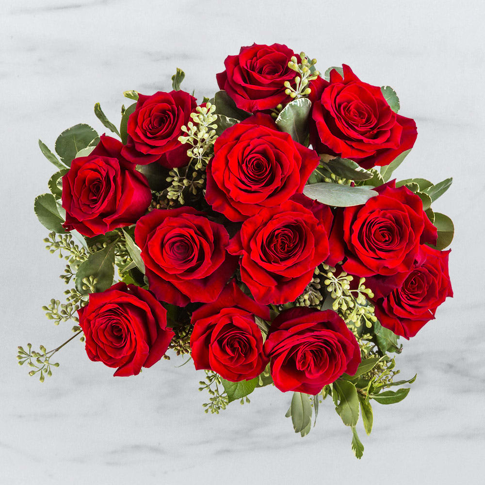 Always and Forever Hand-Tied Bouquet Always and Forever Hand-Tied Bouquet - This is a traditional florist wrapped bouquet of carefully selected premium red roses. Roses and greenery are wrapped in florist tissue and tied with ribbon. Vase is not included.