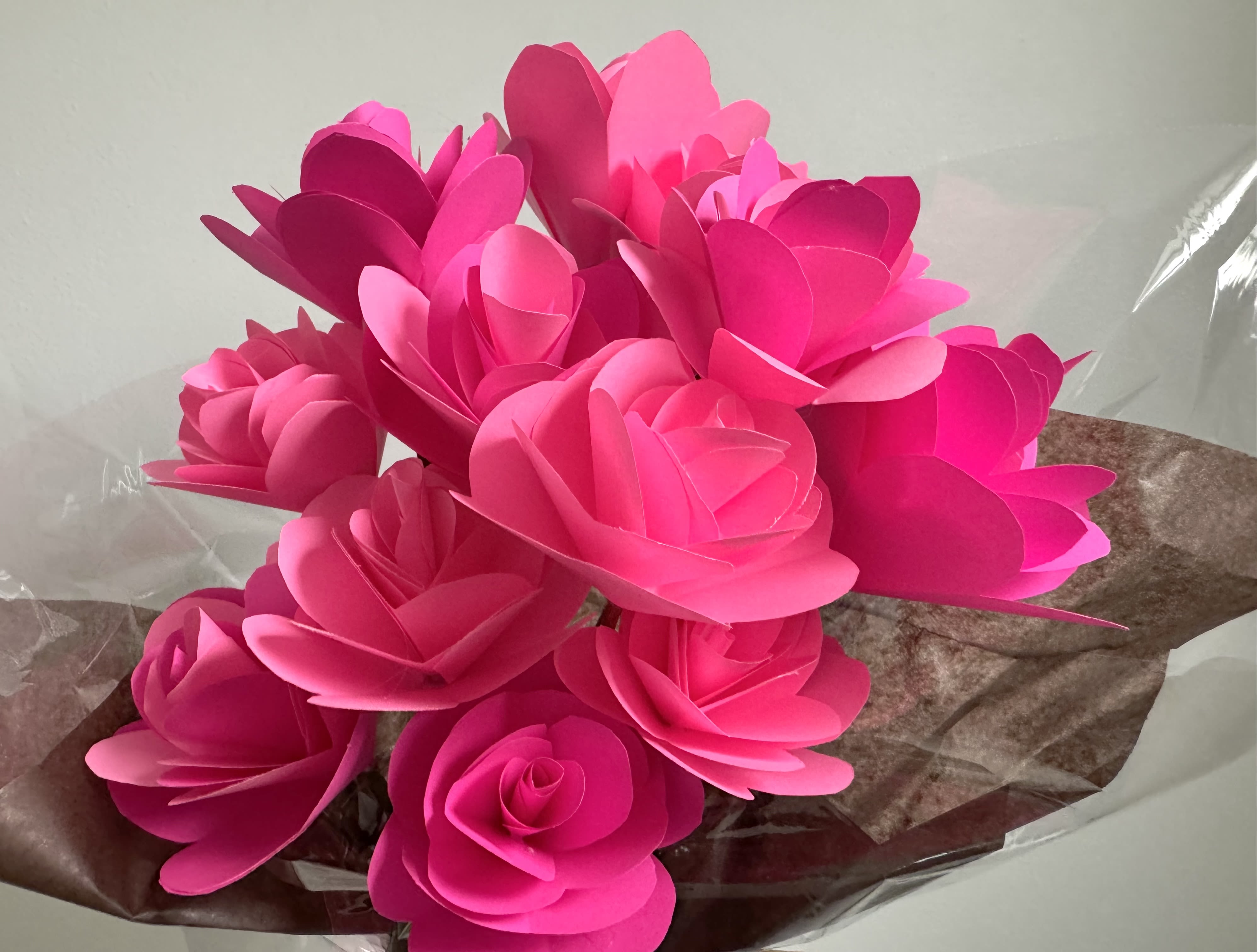 Paper Flower Bouquet. Hand Made in store. LIMITED STOCK - Our hand-made in shop paper flower bouquet is sure to wow your loved one. Our Paper Flower Bouquet is a dozen pink paper flowers that are wrapped in a bouquet.     Delivery Info- Delivery Info- We make all of our deliveries after 1pm every day. 