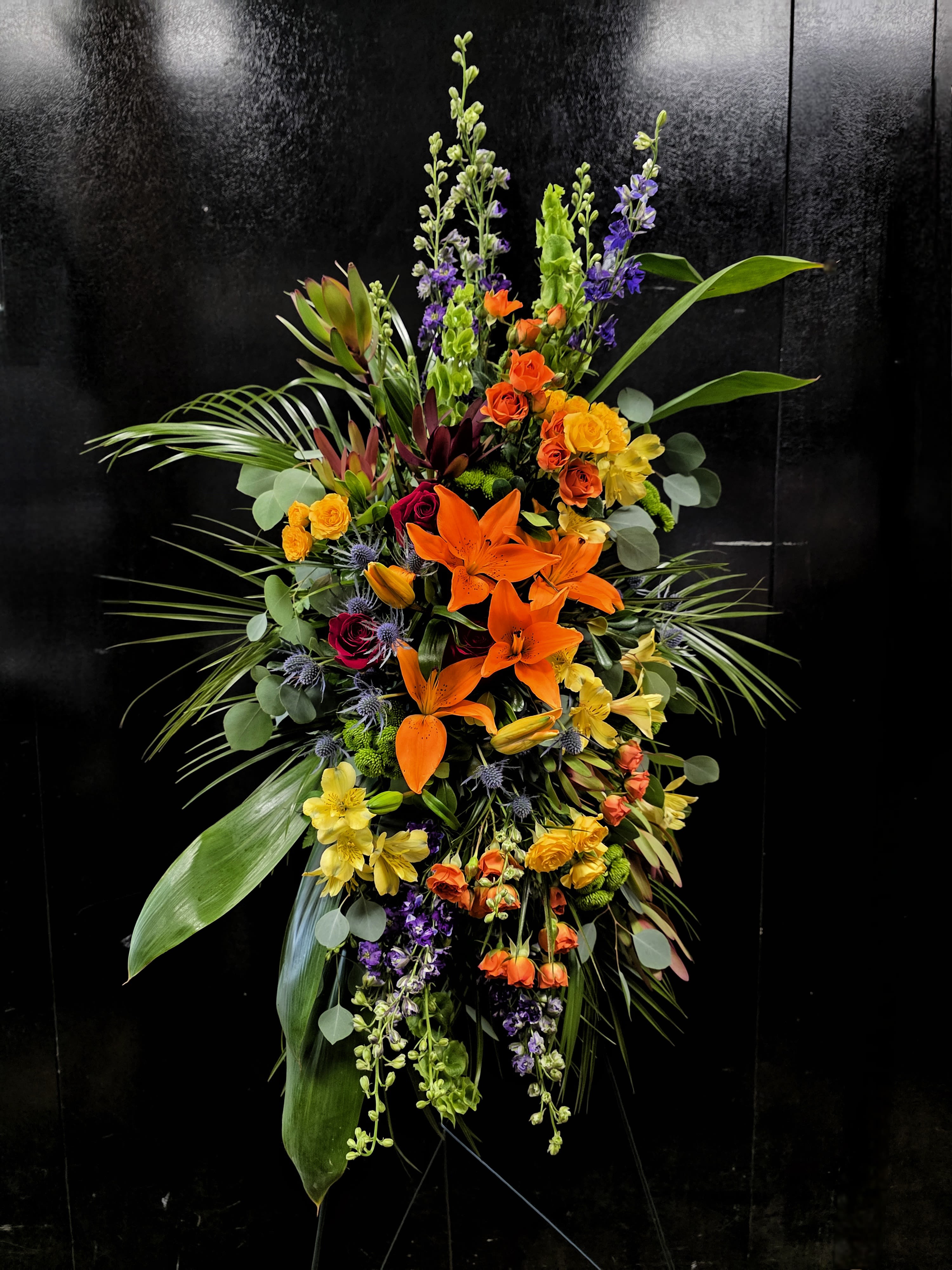 Colorful Memories - Colorful Memories: a mixed flower standing spray with Tropical foliage