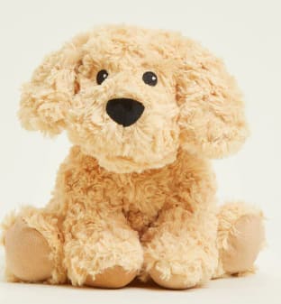 Golden Dog Warmies - Warmies® Plush are fully microwavable to provide hours of soothing warmth and comfort. Plush Golden Dog Warmies is scented with real dried French lavender and perfectly weighted for a positive sensory experience. Warmies make an ideal gift for all ages.  Quick Facts:  Simply Warm Weighted Golden Dog Warmies in a Microwave Soothes, Warms and Comforts Plush Scented with Real French Lavender Chill in a Freezer for Cooling Relief Safe for all Ages Dimensions: 13”x8”x6” Weight: 2lbs