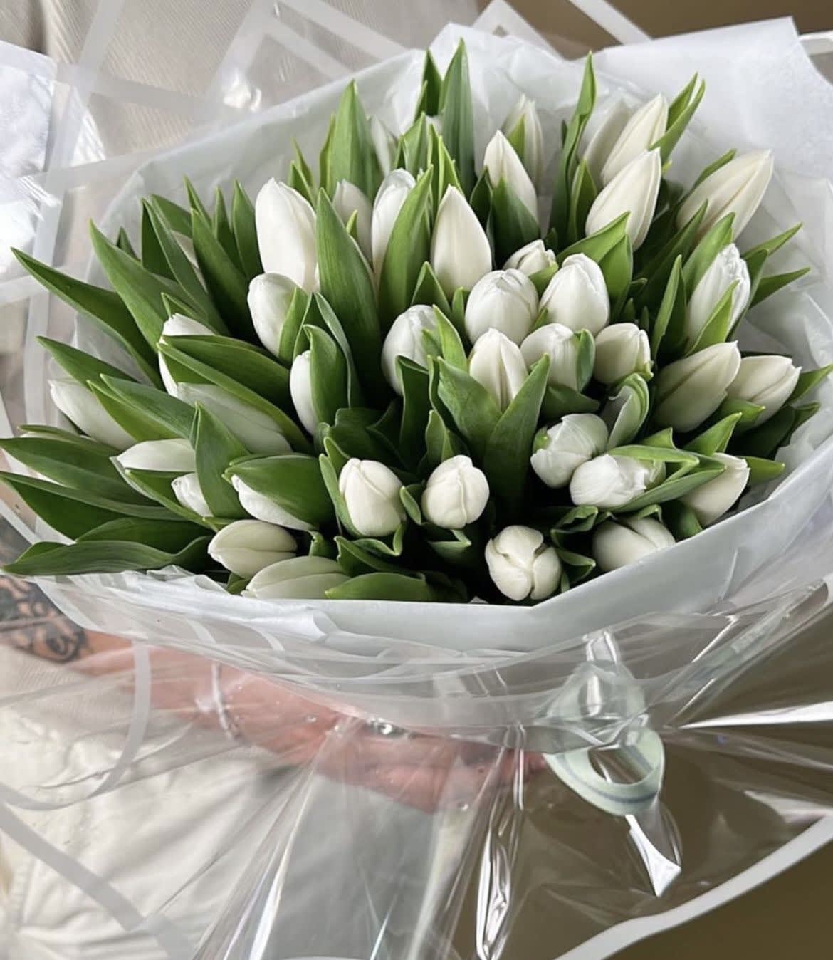 White tulip for elegant lady  - White tulips in a winter is a magic trick. Tulips were born in Turkey but became symbolic flower in Europe and associated with purity, and innocence. White tulips look beautiful in a bunch and create very fresh atmosphere of kindness and warmth.  