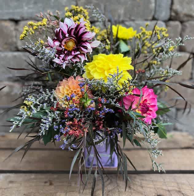 Can’t Take My Eyes Off You Can’t Take My Eyes Off You - Bed of frill greenery mixed with pops of color given by an assortment of blooms