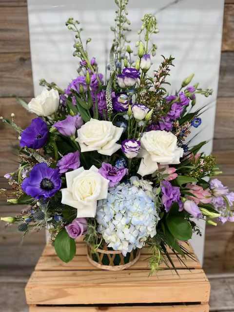 Lean on Me Lean on Me - A beautiful mixture of flowers to honor a loved one.