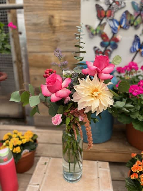 Touch of Pink Touch of Pink - This slim vase with large blooms and textured greens is sure to please!