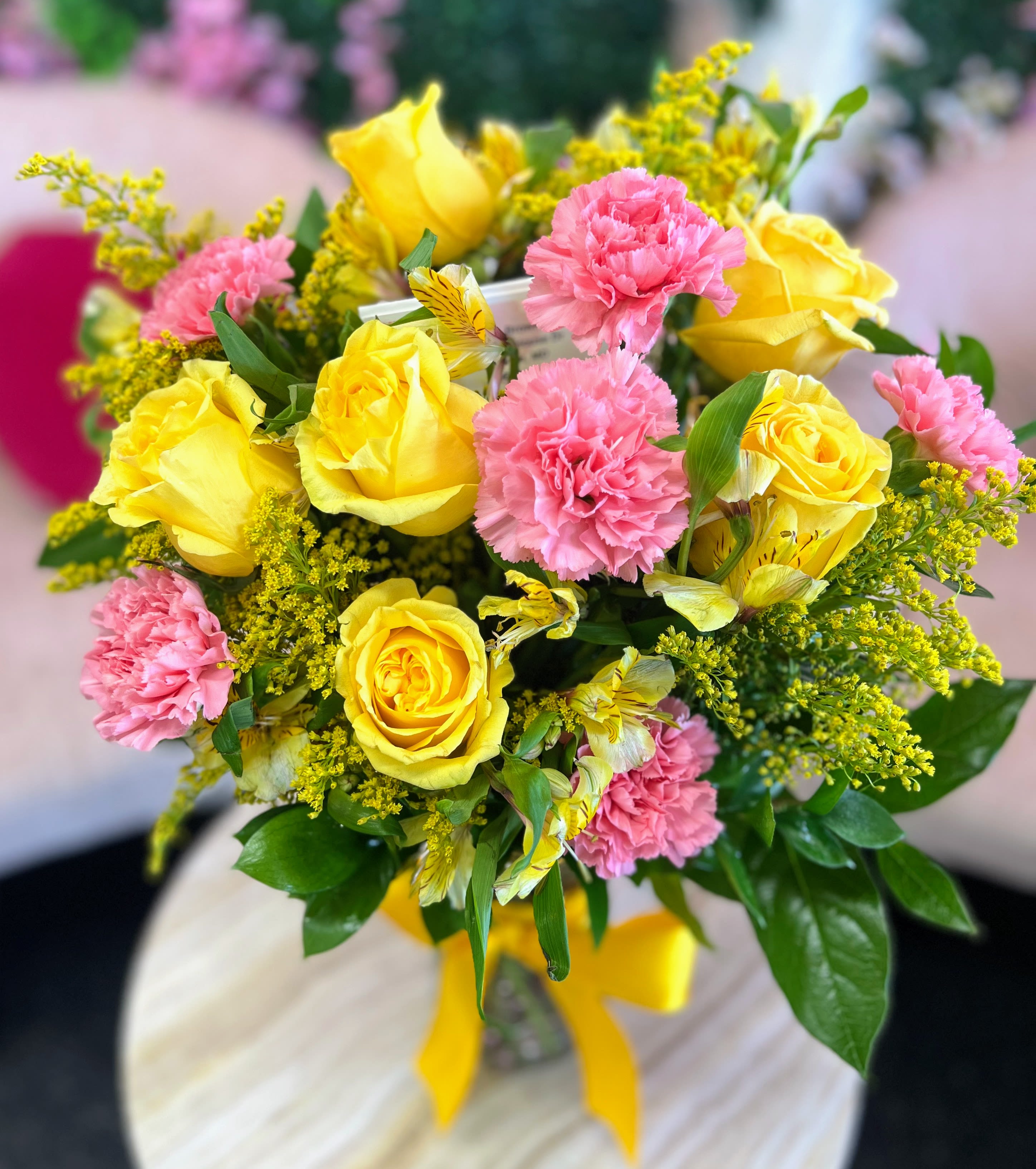 Lemon Drop Delight - A cheerful blend of sunny yellow and soft pink blooms, our Lemon Drop Delight Bouquet brings warmth, joy, and a touch of elegance to any occasion.