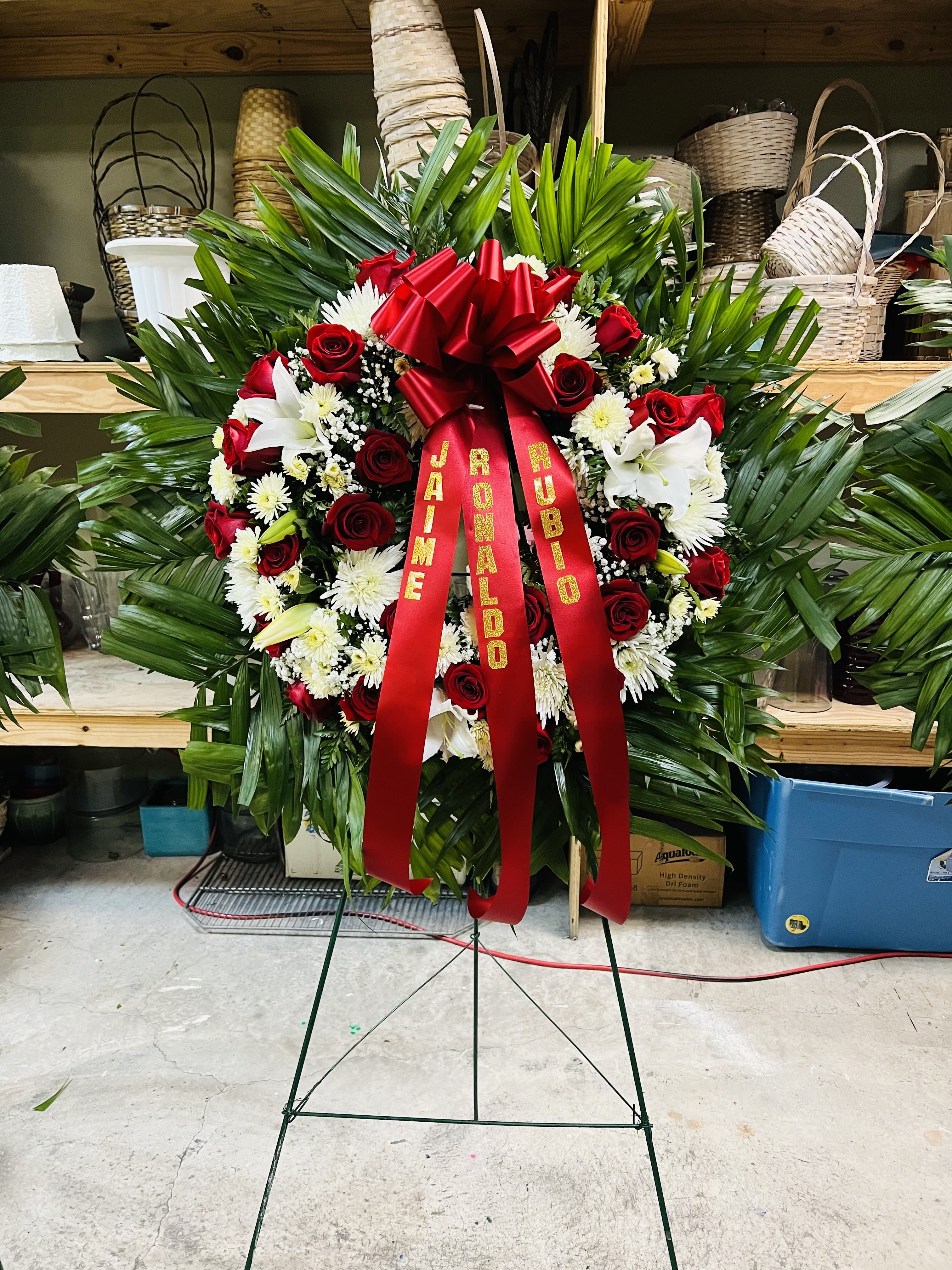 Red and white Easel  - 25  roses , carnations, Lilys 