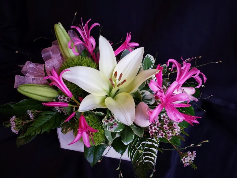 Sweet Box of Blooms  - Whimsical variety of flowers for any occasion. A pleasing combination including greens and filler flowers in a small handmade paper box. Designer's choice of seasonal flowers and colors.  Customize your colors and flowers for an additional fee.
