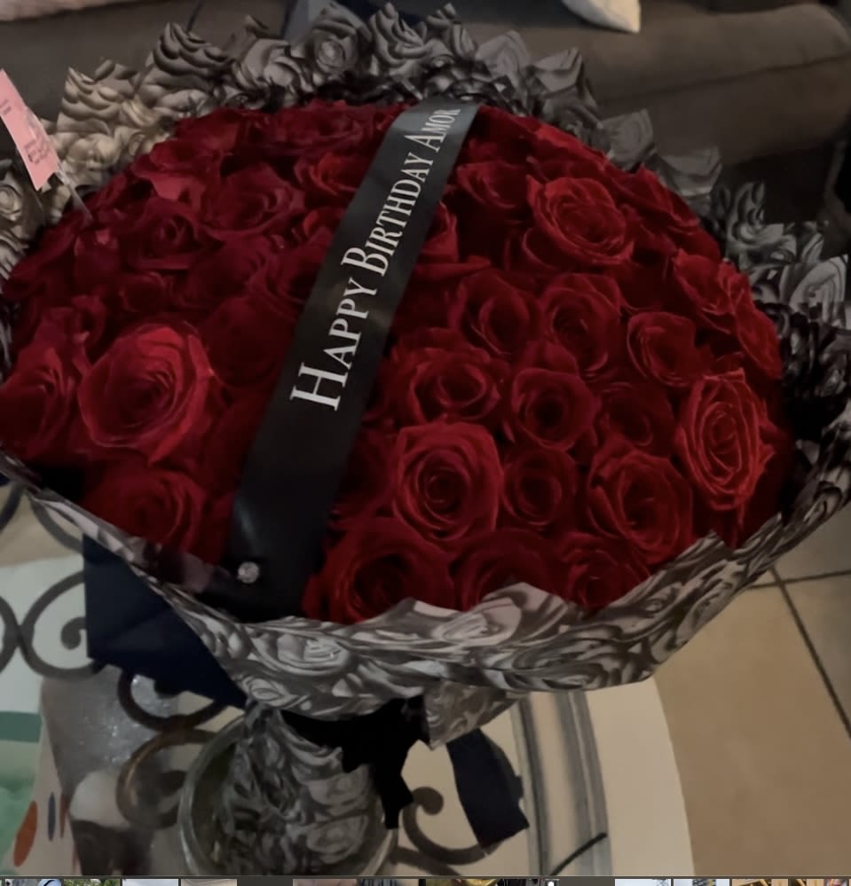 Buchon Bouquet -   Bouquet of Roses wrapped with nice paper and bow.