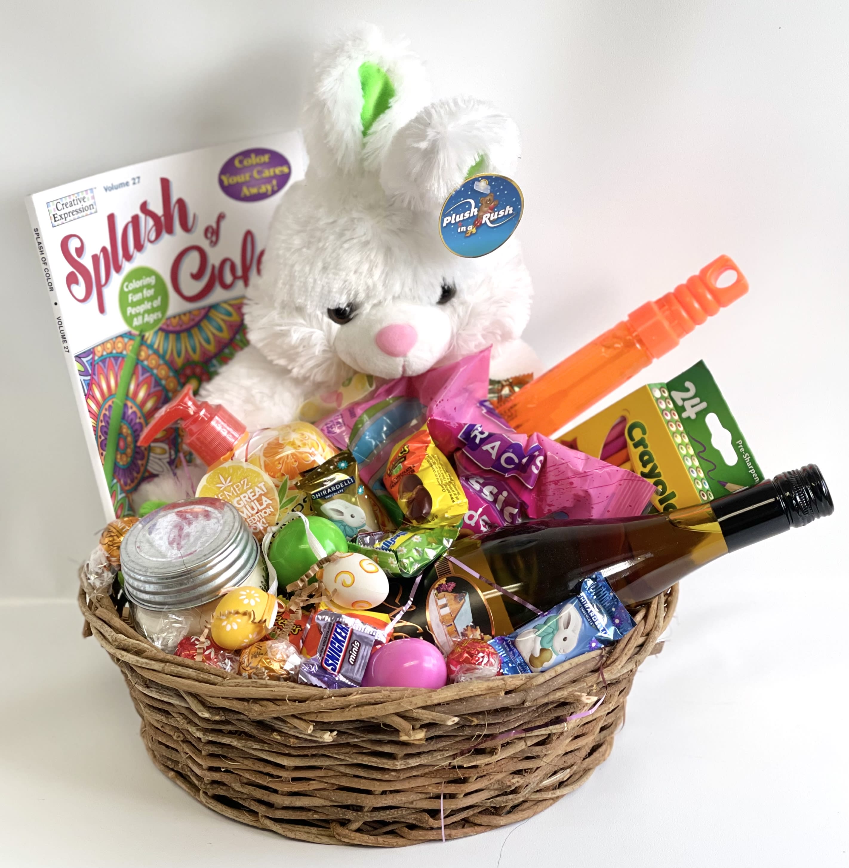 Bunny Brings Wine Easter Basket Bunny Brings Wine Easter Basket - Easter basket filled with lots of treats to include: Adult Coloring Book, Colored Pencils, Candle, Wine from Melrose Vineyards and lots of special treats.