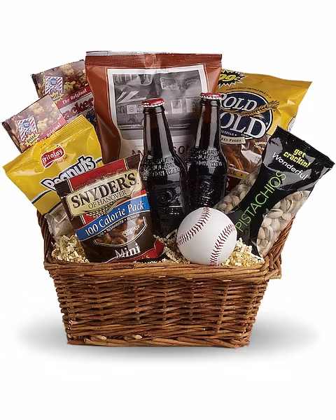 Take Me Out to the Ballgame Basket Take Me Out to the Ballgame Basket - Dads, grads, boys and baseball lovers of all ages will think you're an MVP when you send this winning basket. Full of ballpark favorites and more, perfect for a picnic or a pick-up game in the park. You'll score a home run with this yummy basket that includes a real baseball, of course. Peanuts, pistachios, Cracker Jacks, three different kinds of pretzels and good old-fashioned root beer are teamed up in this basket. Anyone will have a ball with this gift!