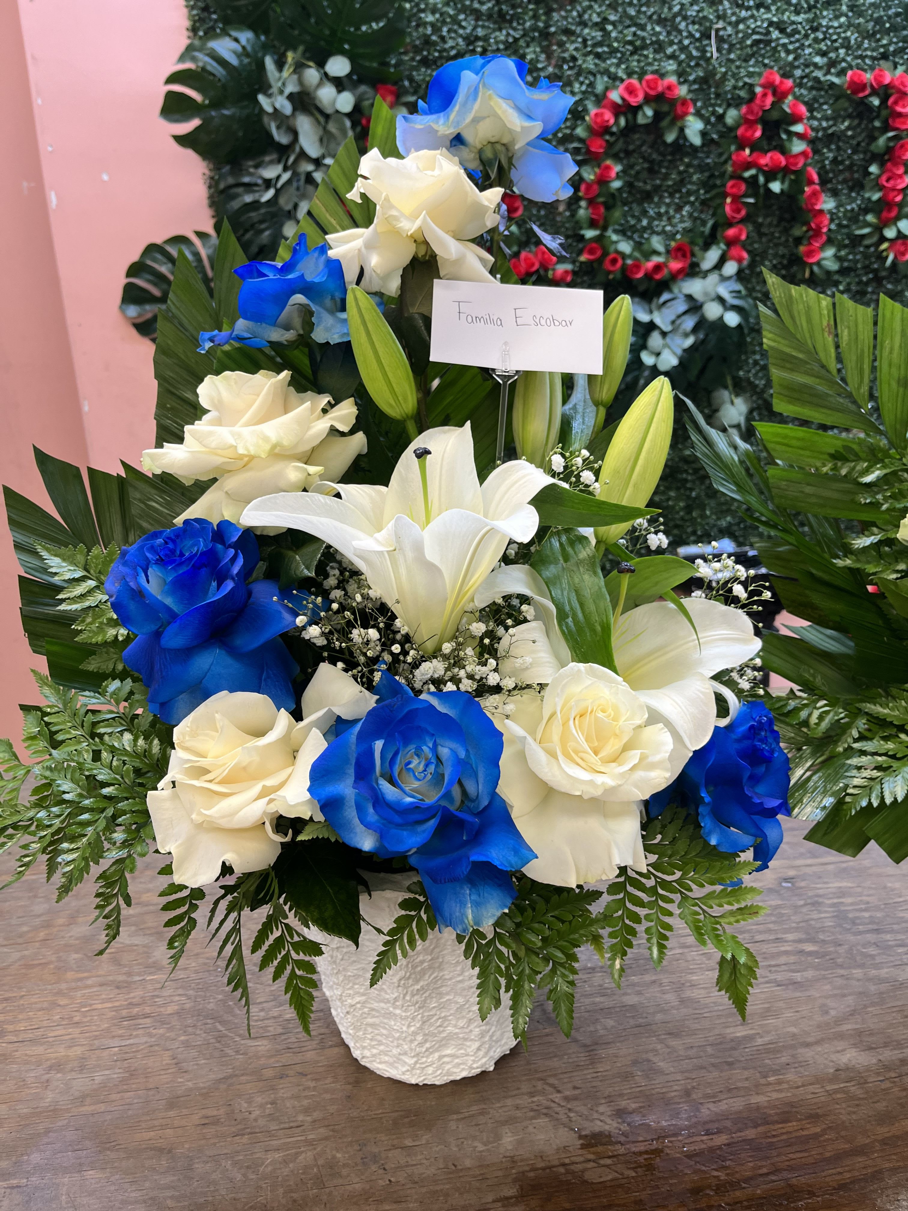 Sympathy arrangement  - Perfect funeral arrangement for him  with roses and lylis 