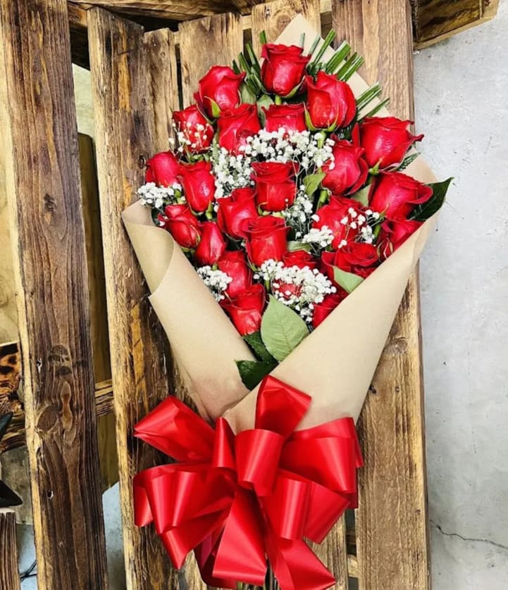 2 Dozen Red Rose Bouquet - 2 Dozen red roses wrapped in paper  with greenery and baby breath
