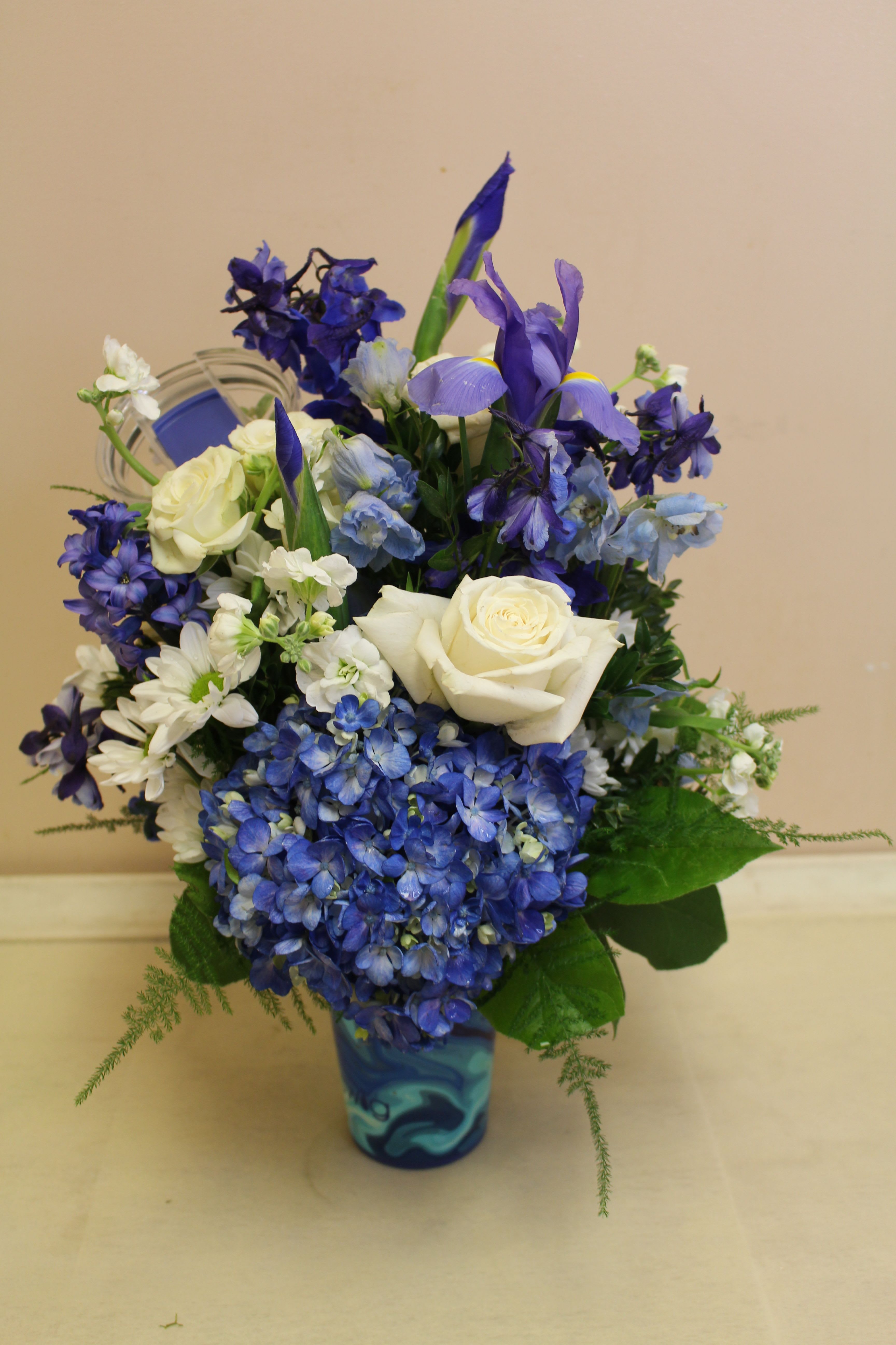 swig coolie large blue lagoon  - Fresh flower arrangement fills an insulated coolie.  Great gift, Flowers and a Coolie! Cool drinks, dry hands!  Make A Wish! Let everyone know it's their (or your) birthday with this celebratory confetti and candle design.   Our insulated Coolies stop condensation and keep drinks cold for 2+ hours. Our lightweight Iced Drink Cup Coolie can be carried anywhere and stores away flat, making it a carpool to office must-have! Crafted from durable, high quality 3mm thick neoprene Keeps drinks cold 2+ hours Designed to fit medium iced cups: Dunkin® Medium, Starbucks® Venti, McCafé® large &amp; Other 22-28oz Cold beverage cups Features easy-grip hand strap Stops messy drips Keeps hands dry &amp; warm Flexible, lightweight and durable Machine washable Great on-the-go, folds flat Measures: 5&quot; H x 5&quot; W (at widest when flat) x 3.5&quot; D