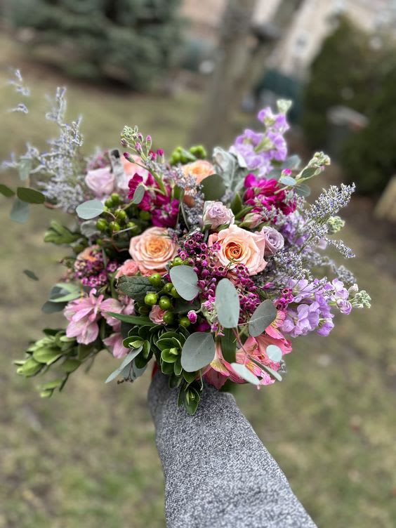 Buy me a bouquet/ Designer's choice - All the good things available at the store that day.