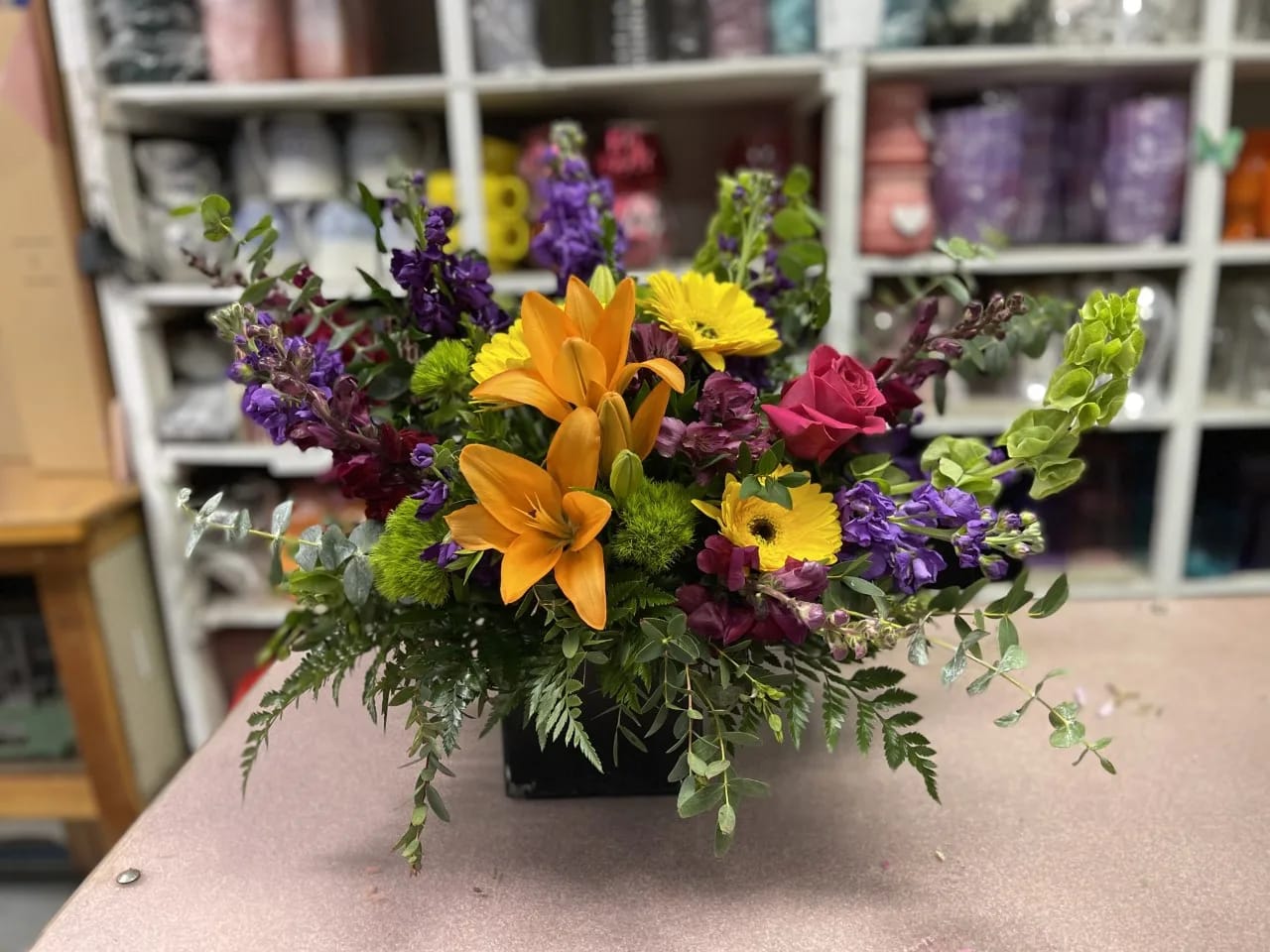 PRETTY THANG PRETTY THANG - A BEAUTIFUL MIX OF SPRING FLOWERS BILLOWING OUT OF IT'S CONTAINER, SHOWING OFF IT'S A PRETTY THANG!